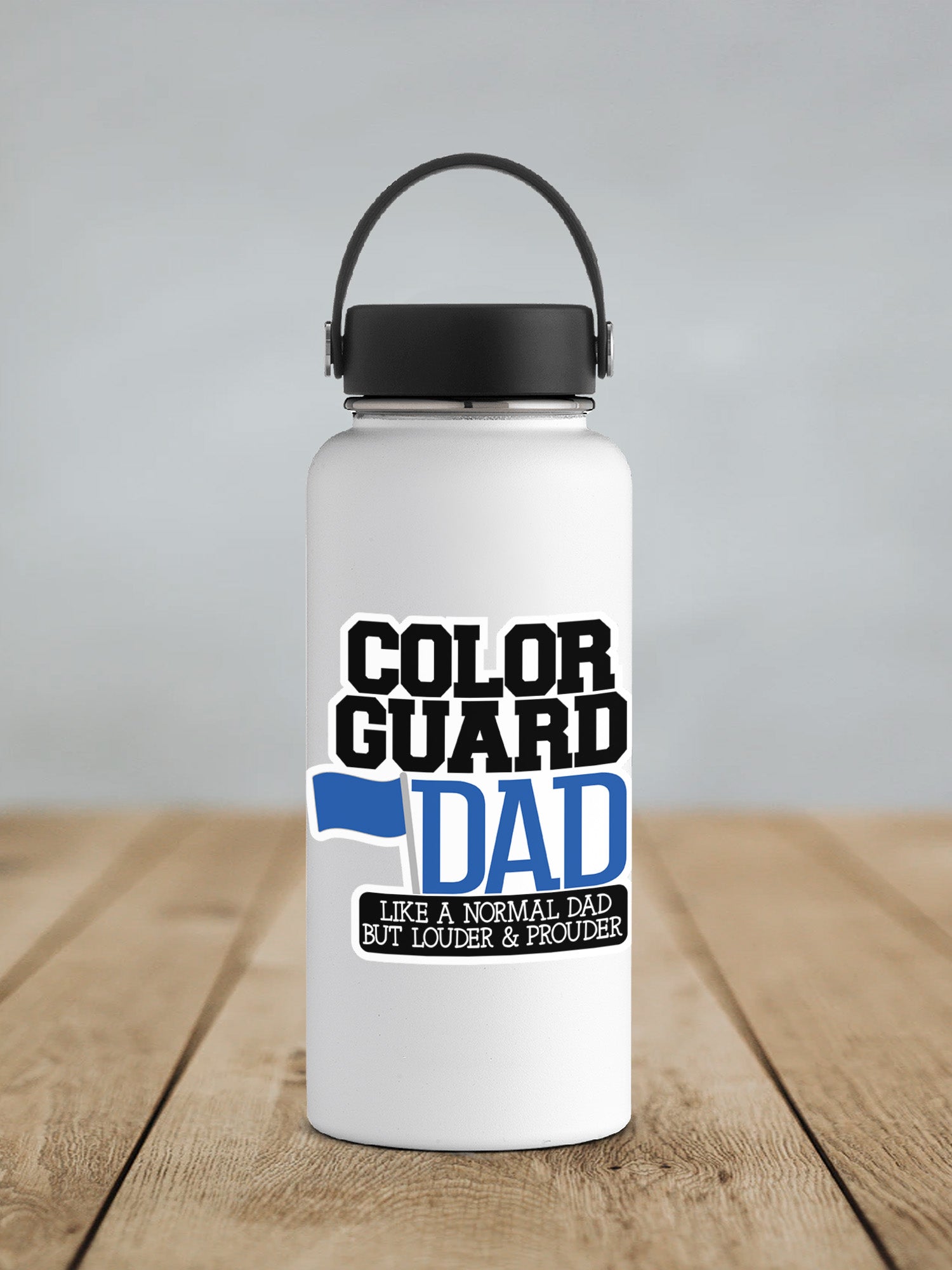 a white water bottle sitting on top of a wooden table