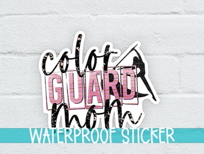 a white brick wall with a sticker that says, color guard mom