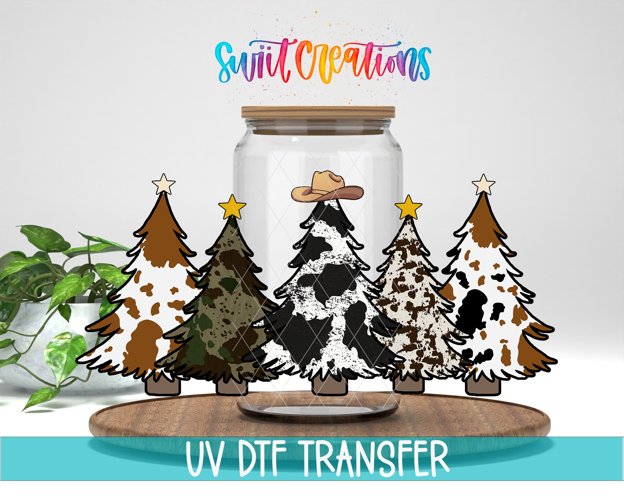 A glass jar containing a cartoon Christmas tree with a cowboy hat, surrounded by four other Christmas trees with different patterns, all set against a plain white background.