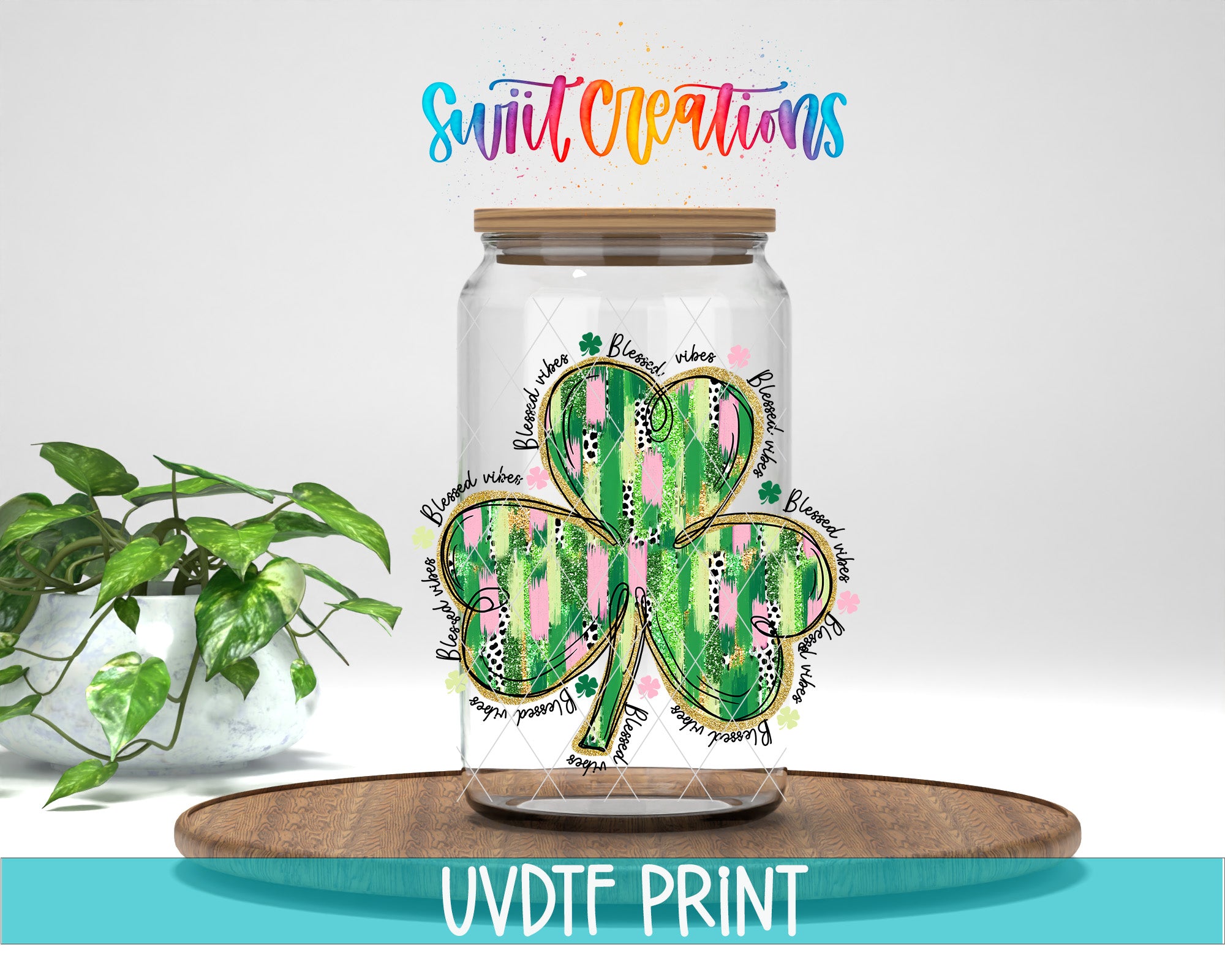A glass jar with a shamrock design on it, placed on a wooden surface. The jar has a label with the text "Swift Creations" and "UVDF PRINT".