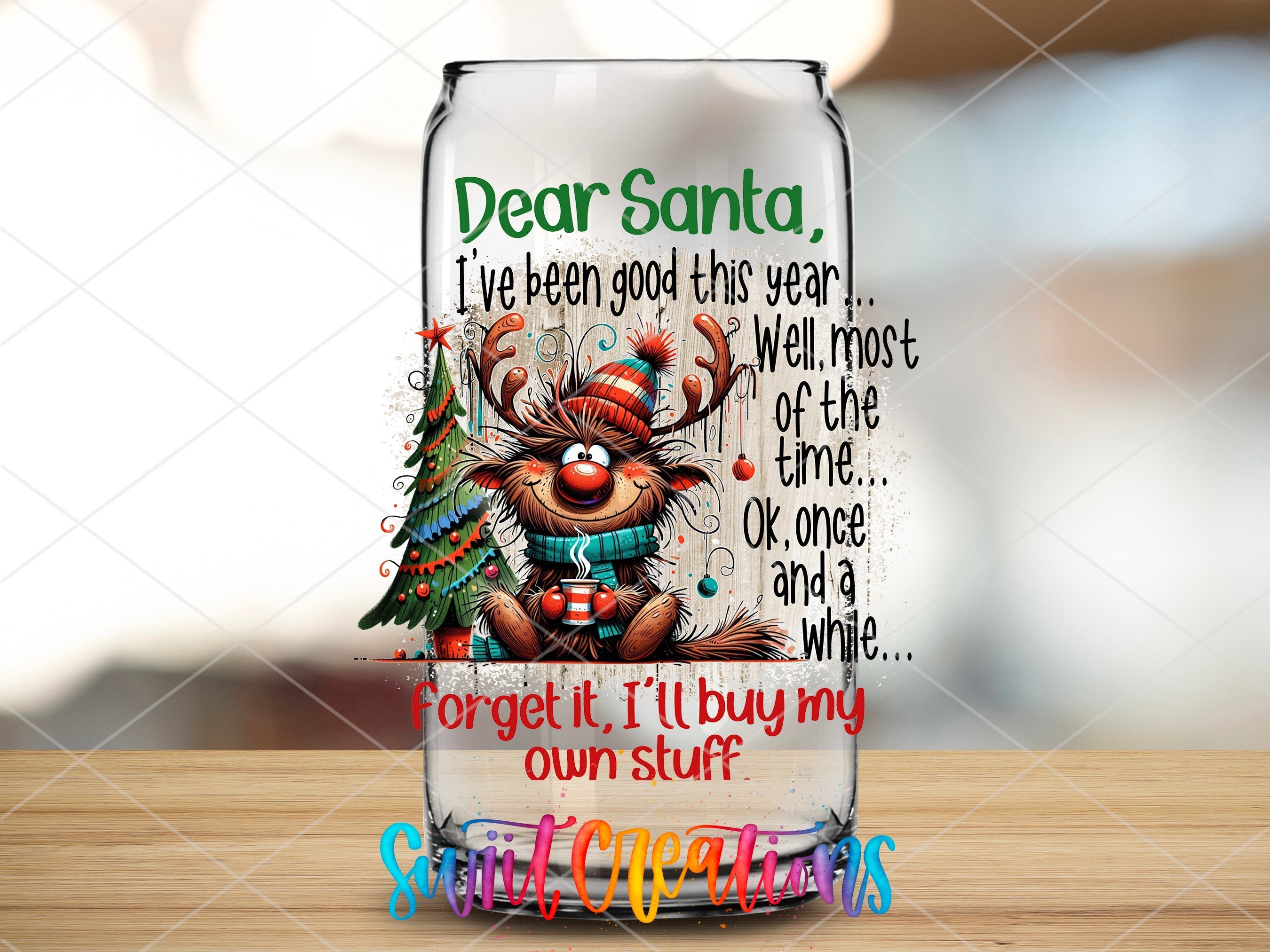 a glass with a picture of a reindeer on it