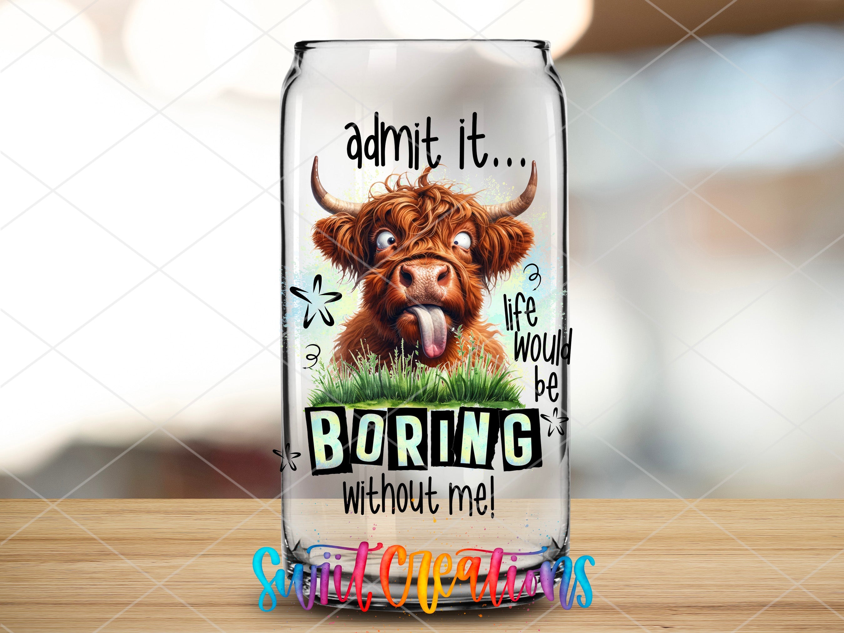 a glass bottle with a picture of a cow on it
