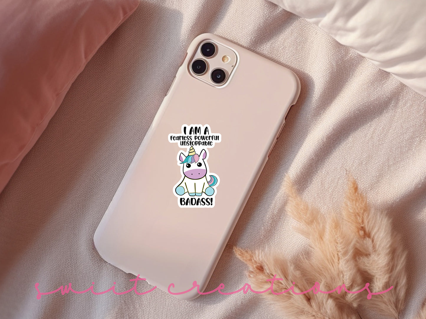 a phone case with a unicorn sticker on it