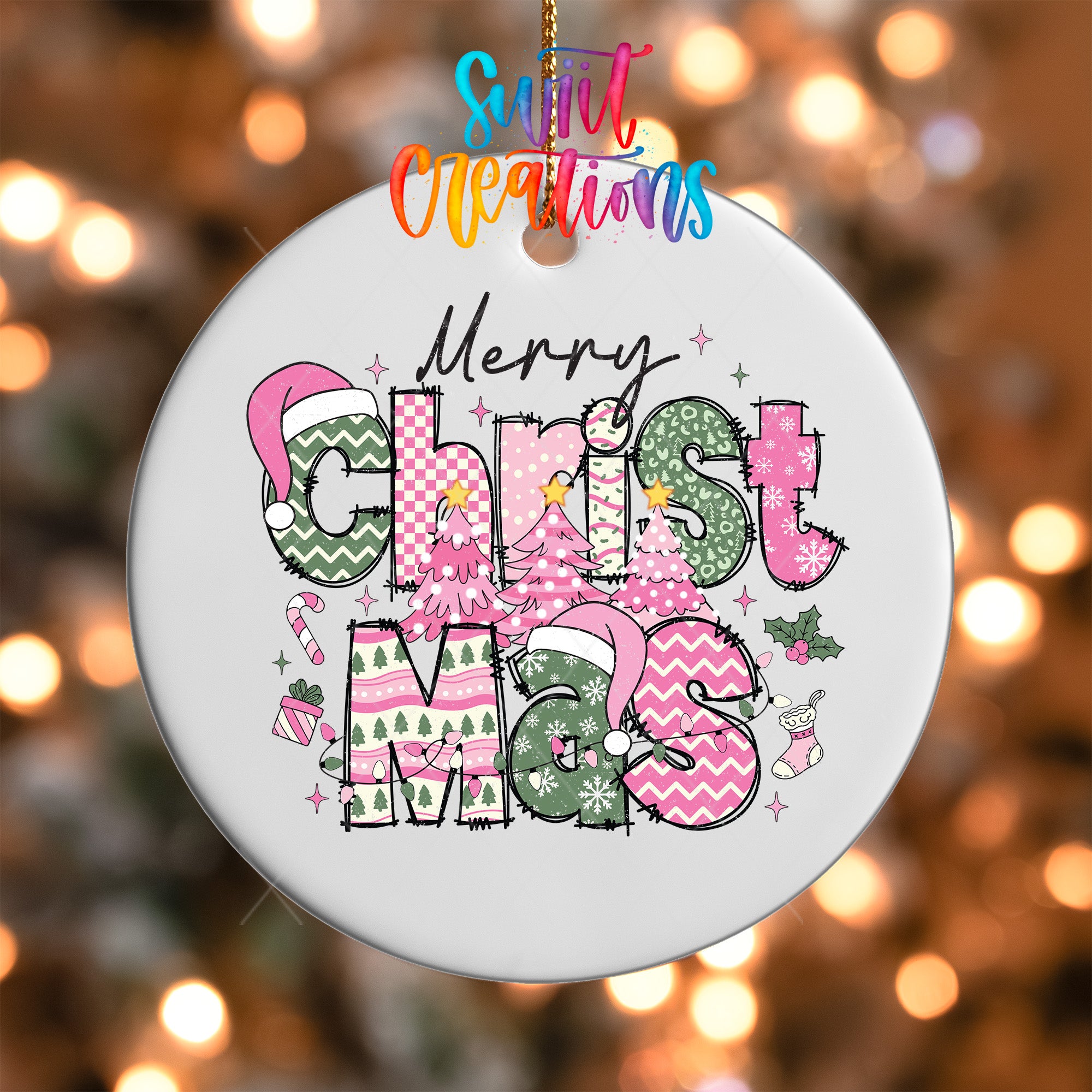 A white Christmas ornament with the text "Merry Christmas" and various Christmas-themed elements such as trees, stars, and snowflakes.