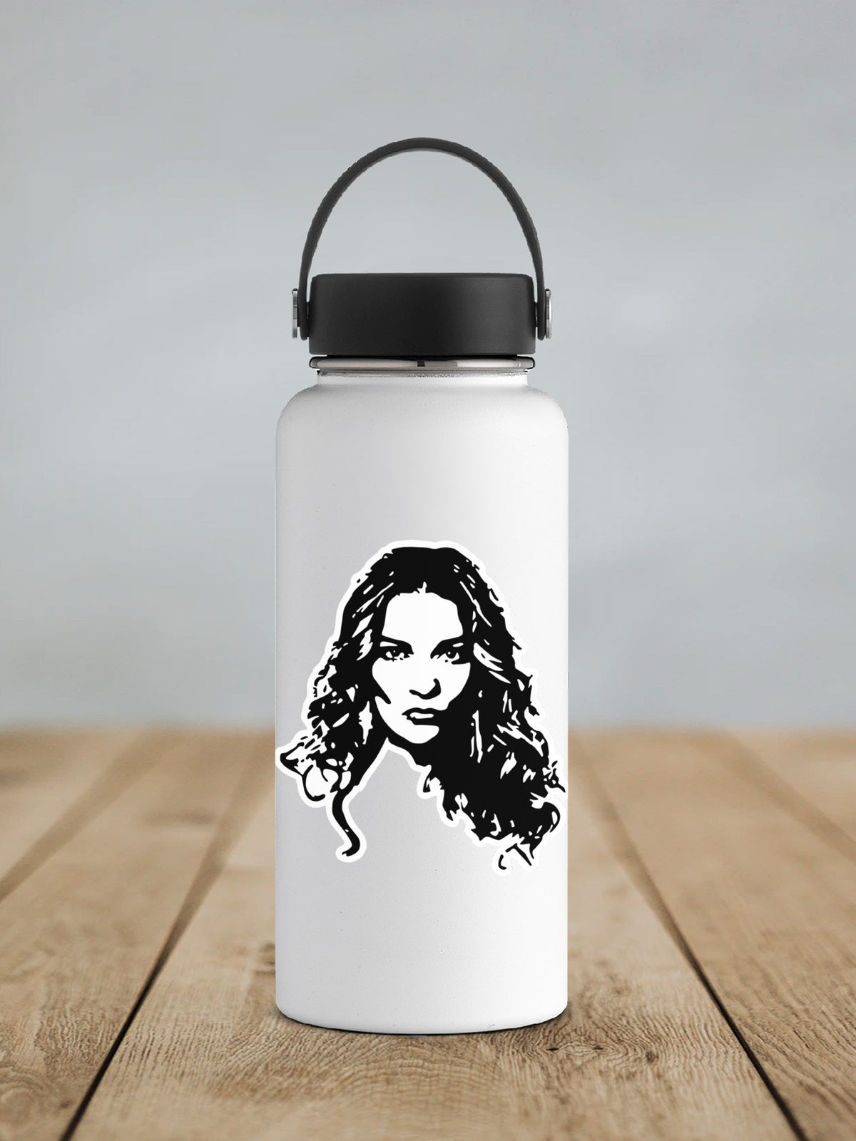 Alexis Portrait sticker on a white insulated water bottle