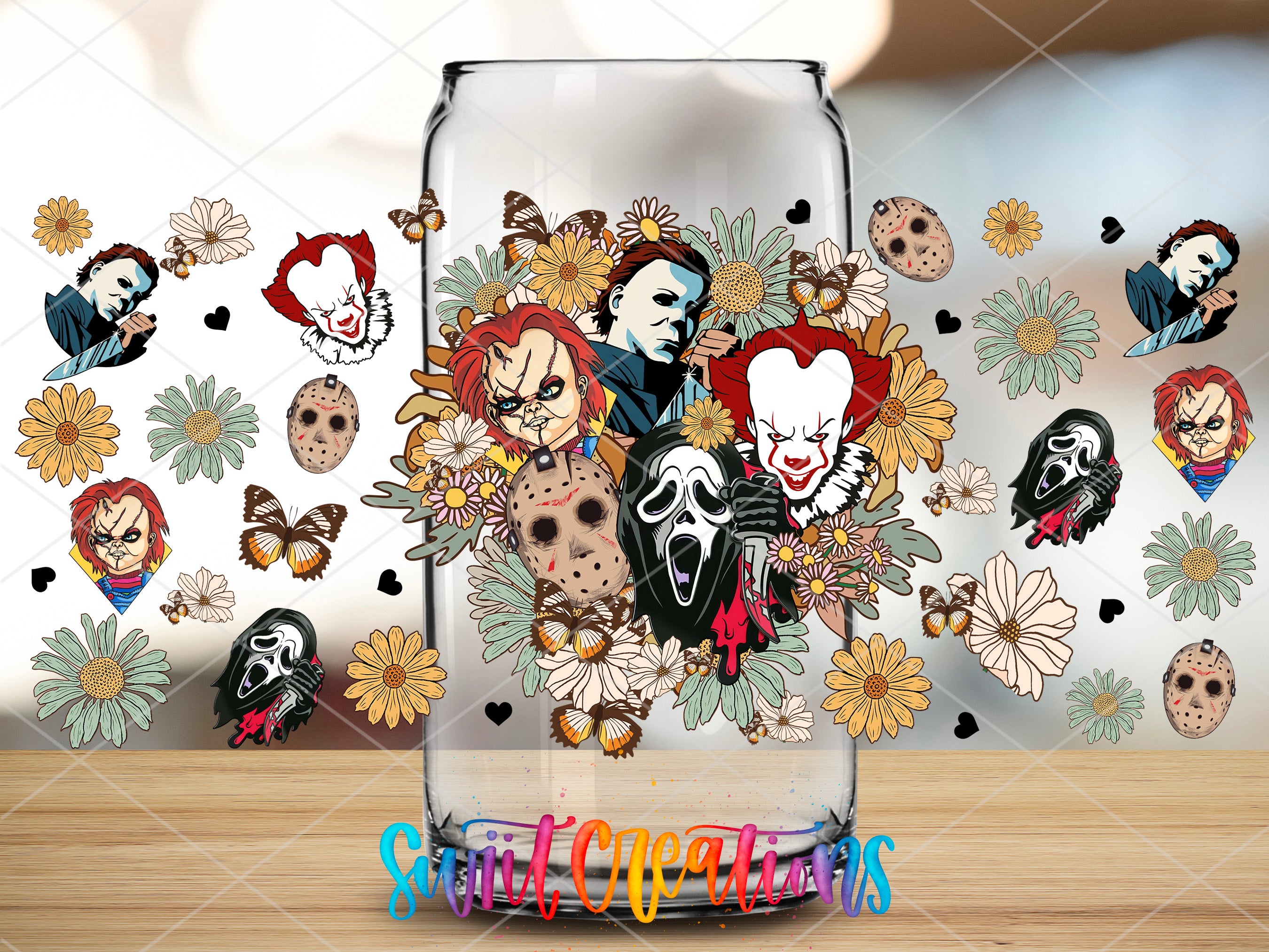 a glass with a bunch of cartoon faces on it