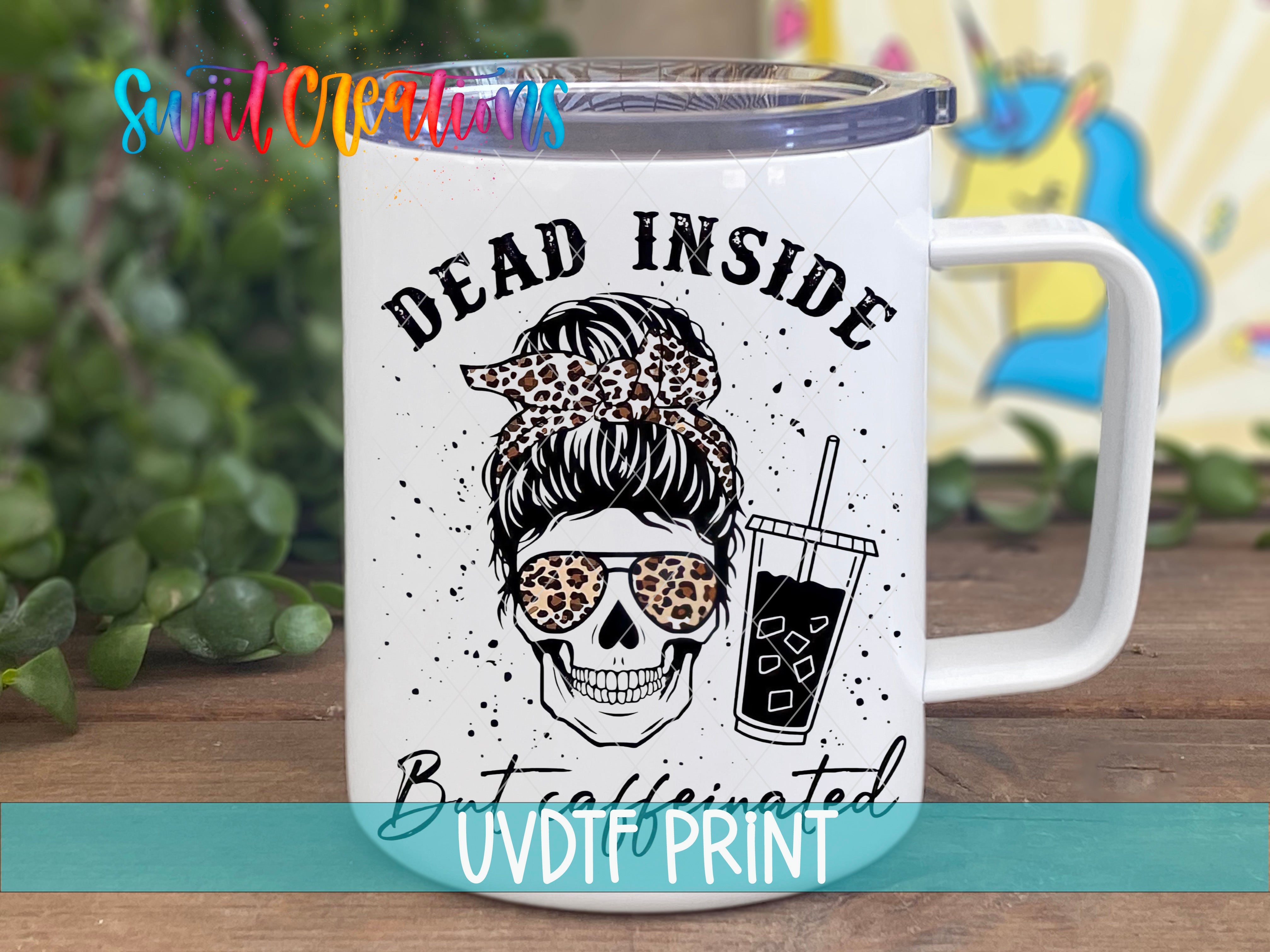 a white coffee mug with the words dead inside