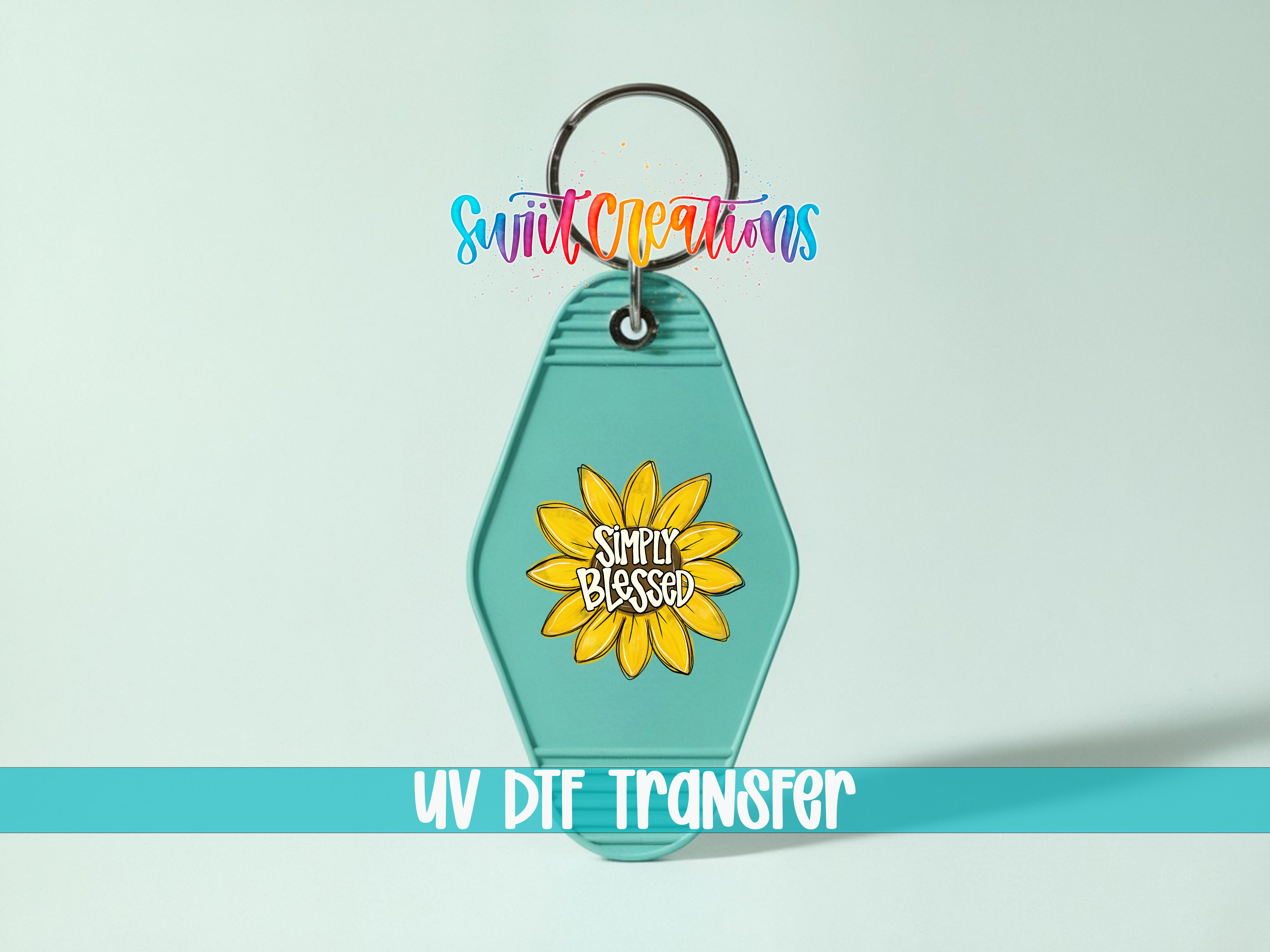 A keychain with a sunflower design and the text "Simply Blessed" printed on it.
