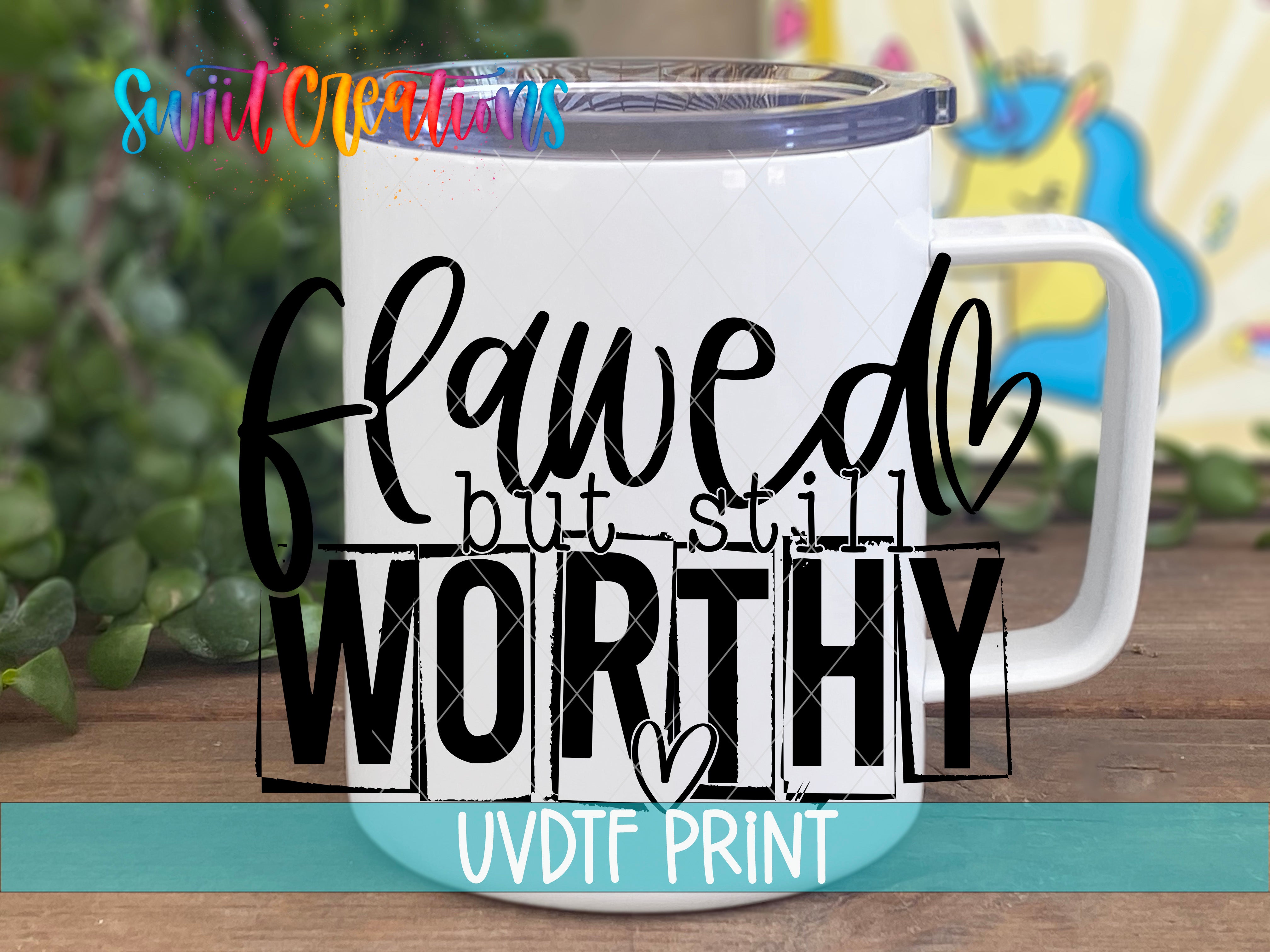 a white coffee mug with a black lettering on it