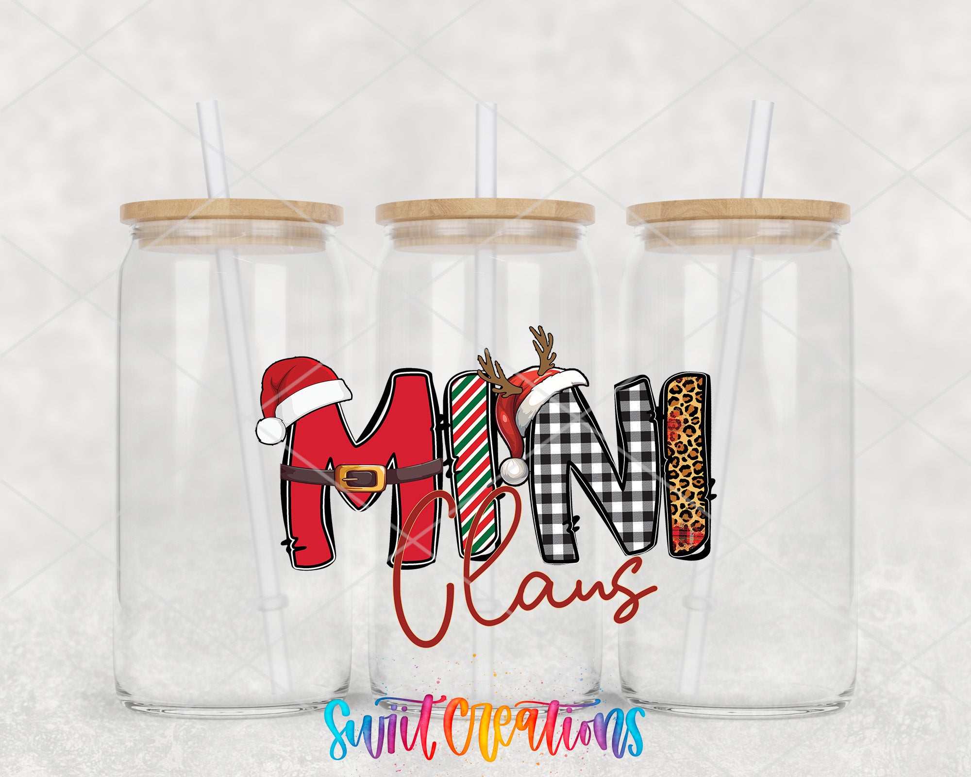 a couple of clear cups with a santa clause on them