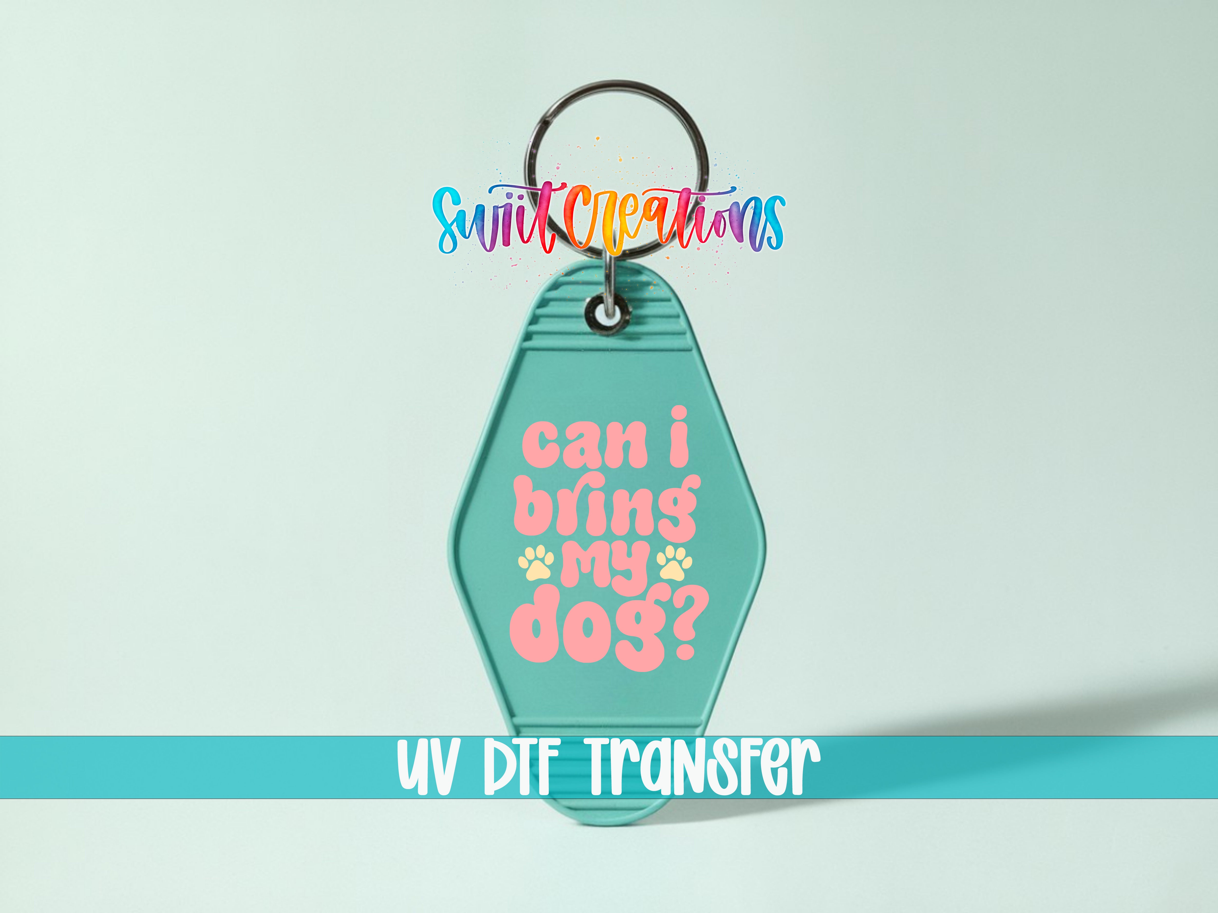 A keychain with a message that says "Can I bring my dog?" in a colorful, playful font.
