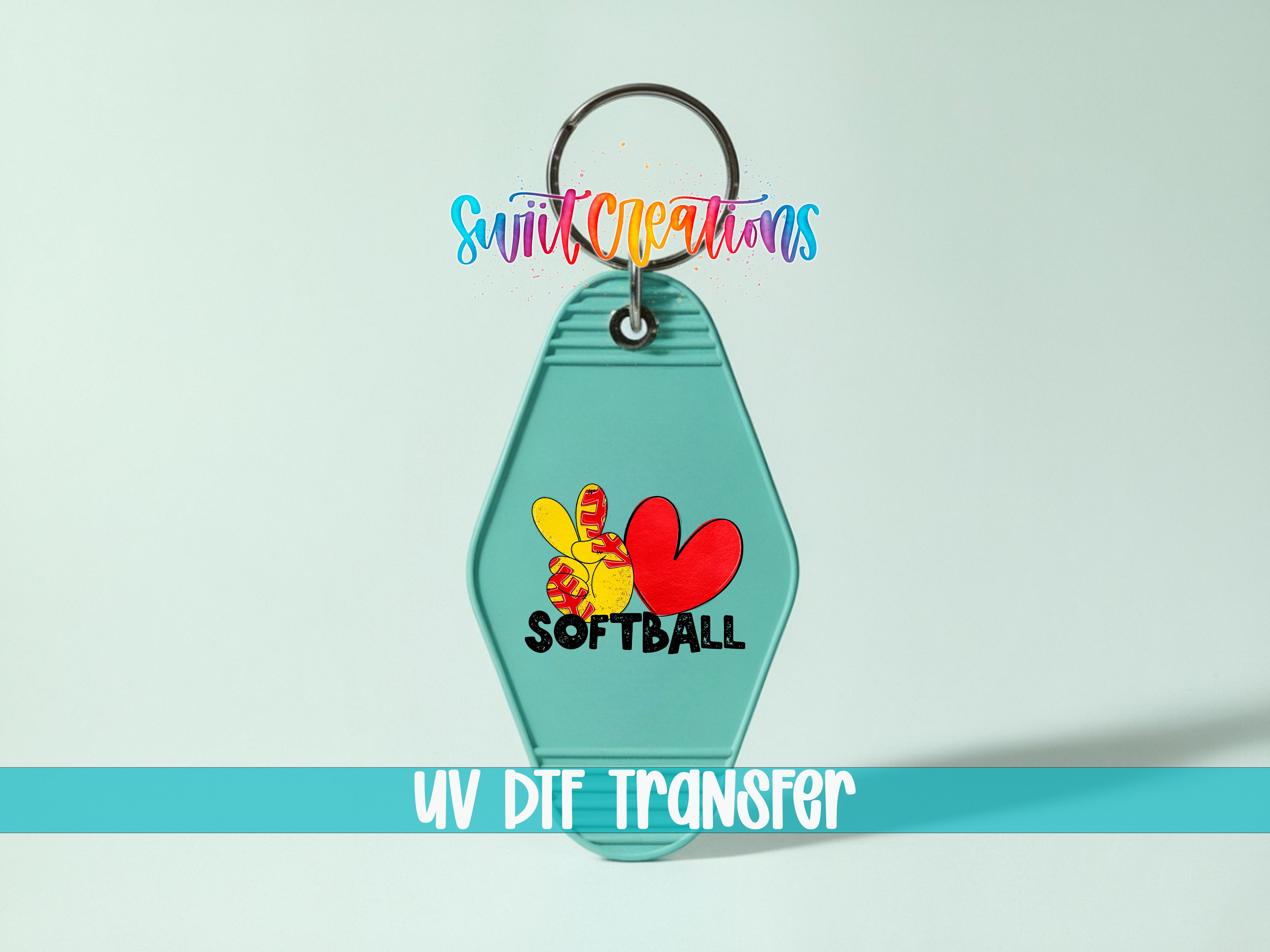 A keychain with a design featuring a peace sign and the word "SOFTBALL" printed on it.
