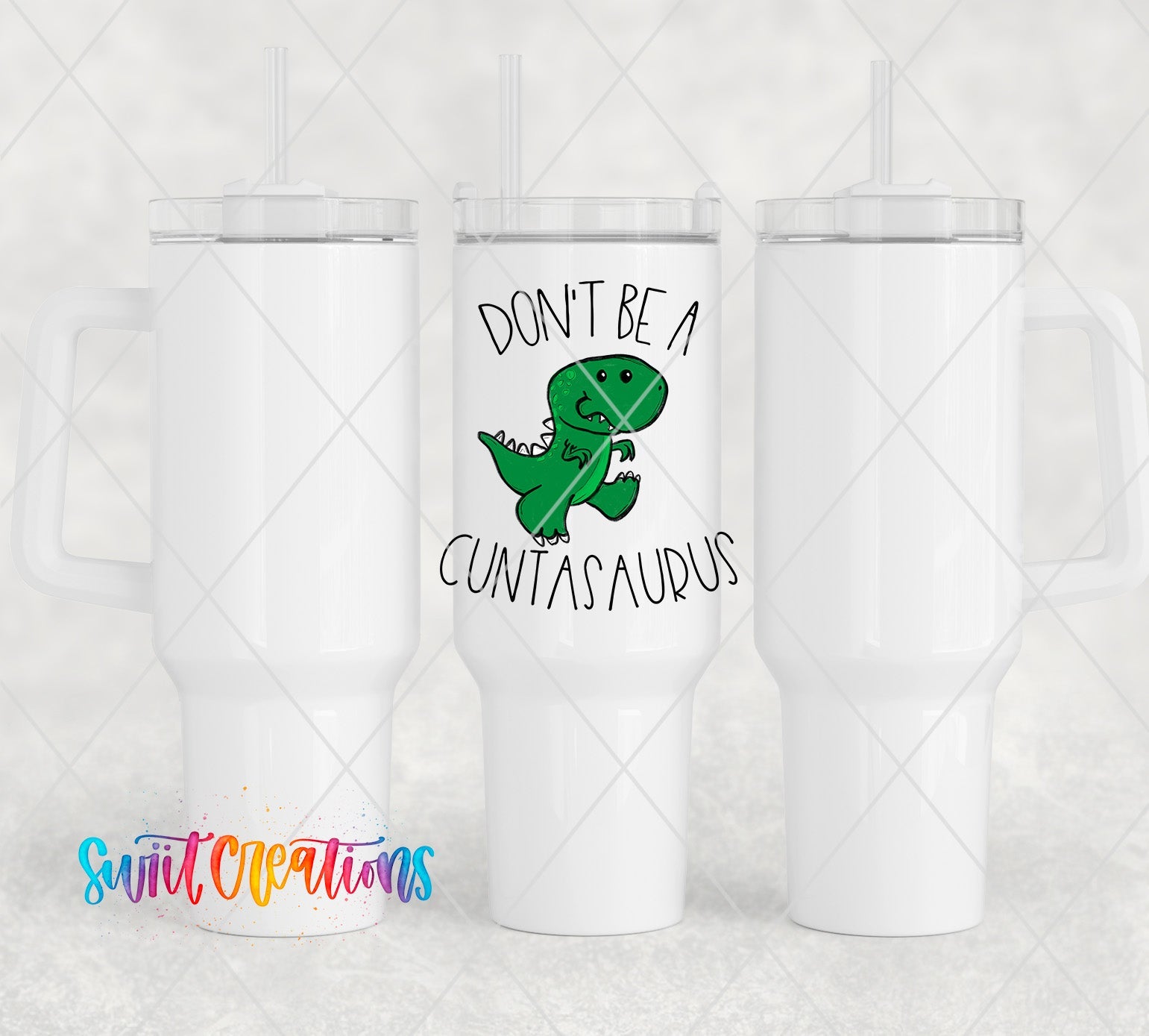 a white cup with a green dinosaur on it