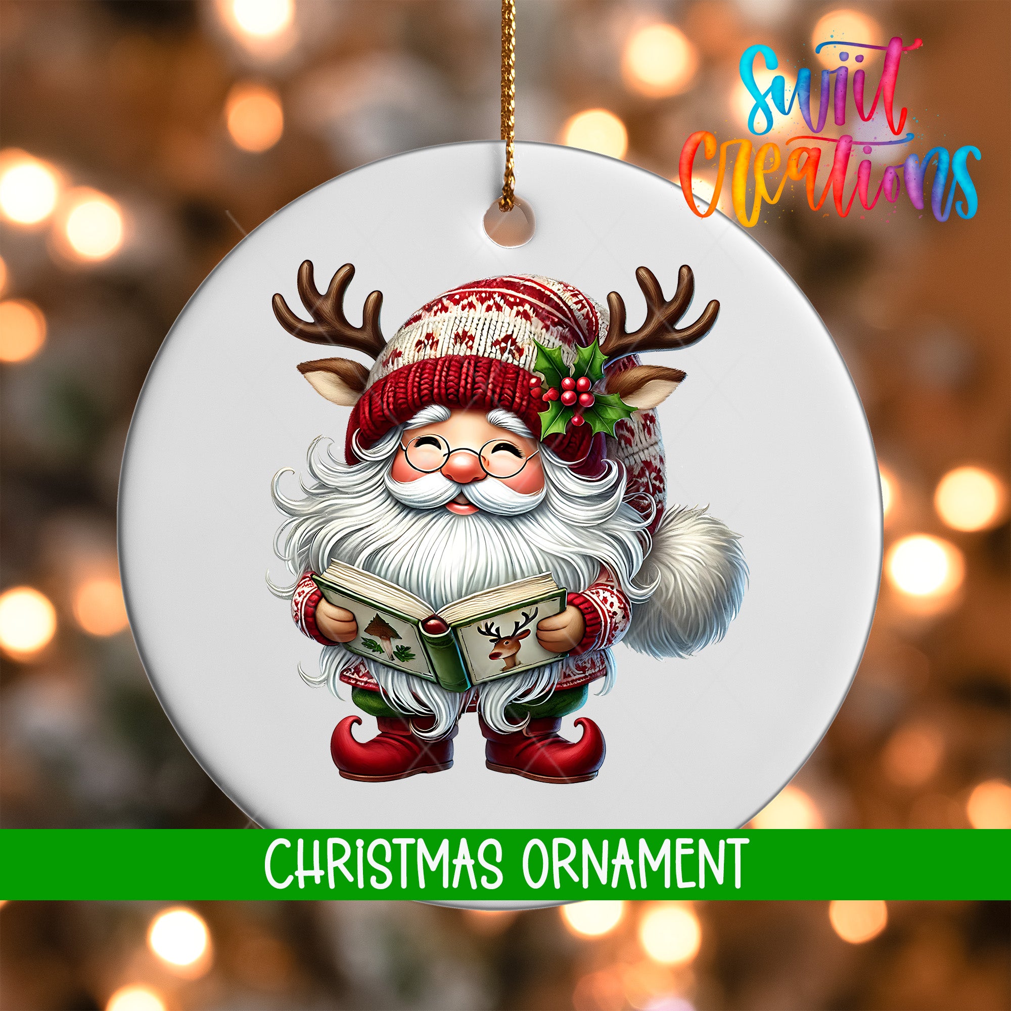 A Christmas ornament featuring a smiling Santa Claus holding a book and wearing a red and white hat with antlers.