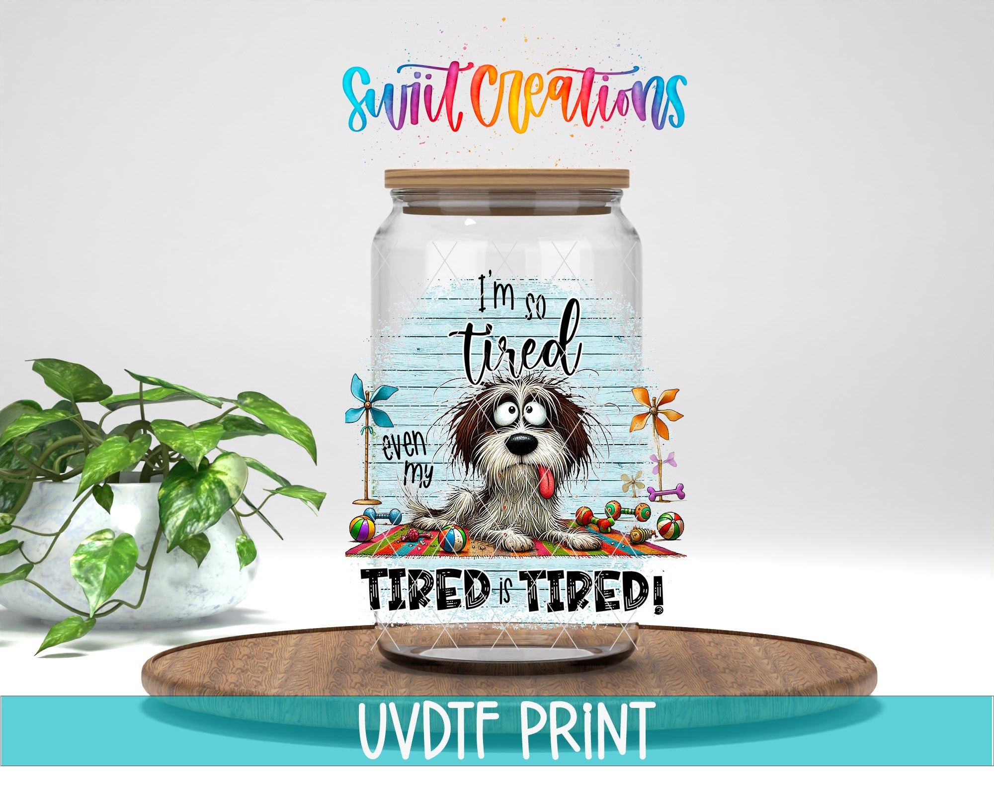 A jar with a cartoon dog on it, accompanied by the text "I'm so tired even my dog is tired!" and "TIRED IS TIRED!" The jar is placed on a wooden surface, with a potted plant in the background.