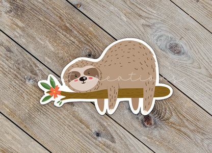 a sticker of a slotty sleeping on a branch