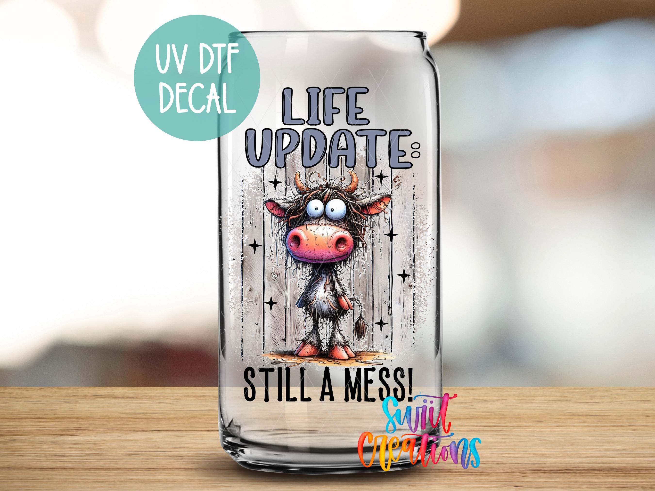 a glass with a picture of a cow on it