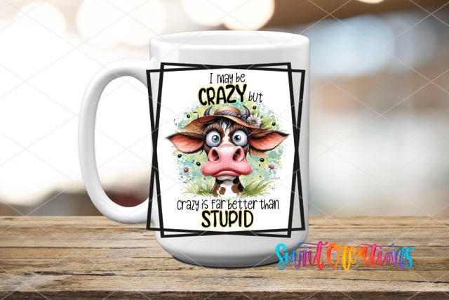 a coffee mug with a picture of a cow wearing a hat