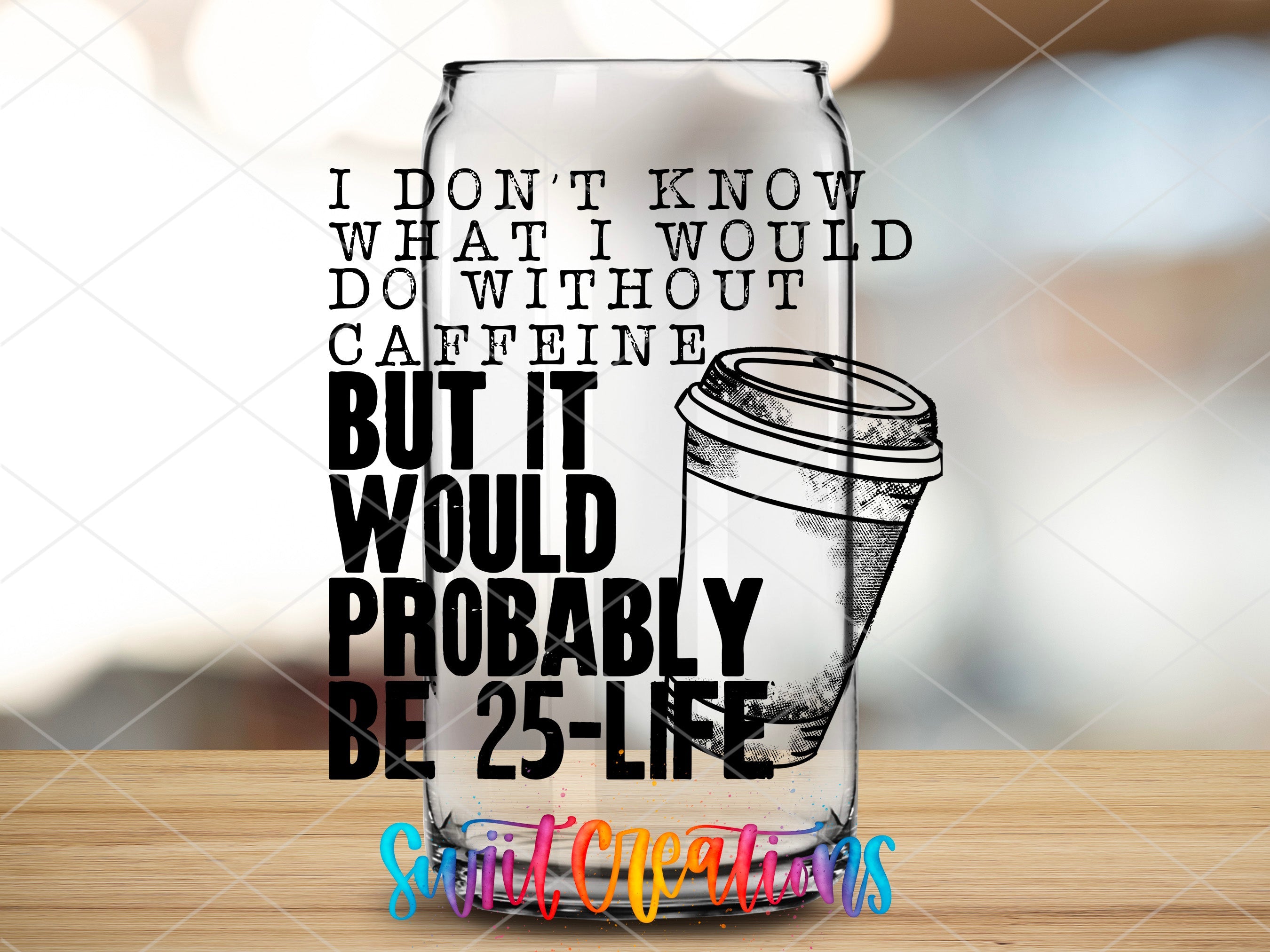 a glass with a quote on it sitting on a table