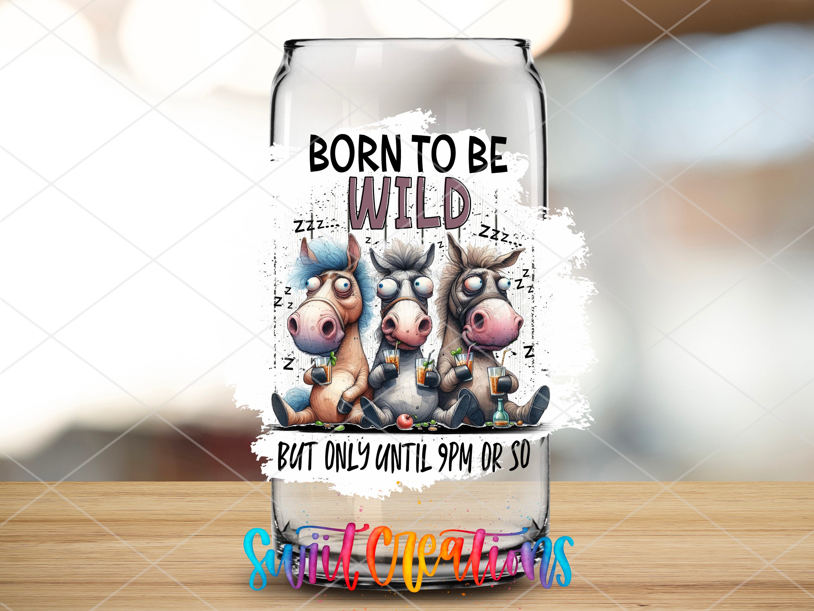 a glass bottle with a picture of three cows on it
