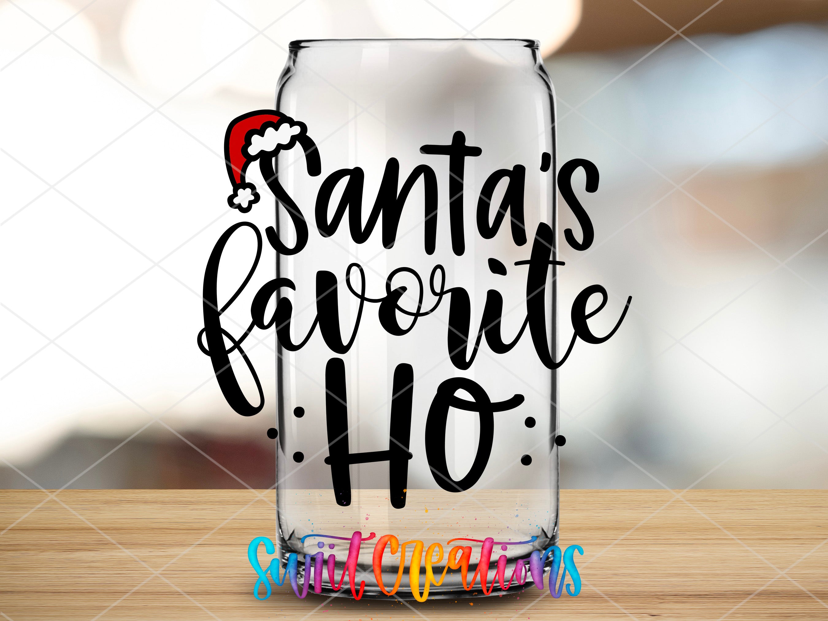 a glass with santa's favorite ho written on it