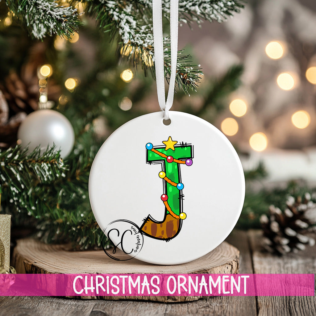 a christmas ornament hanging from a christmas tree
