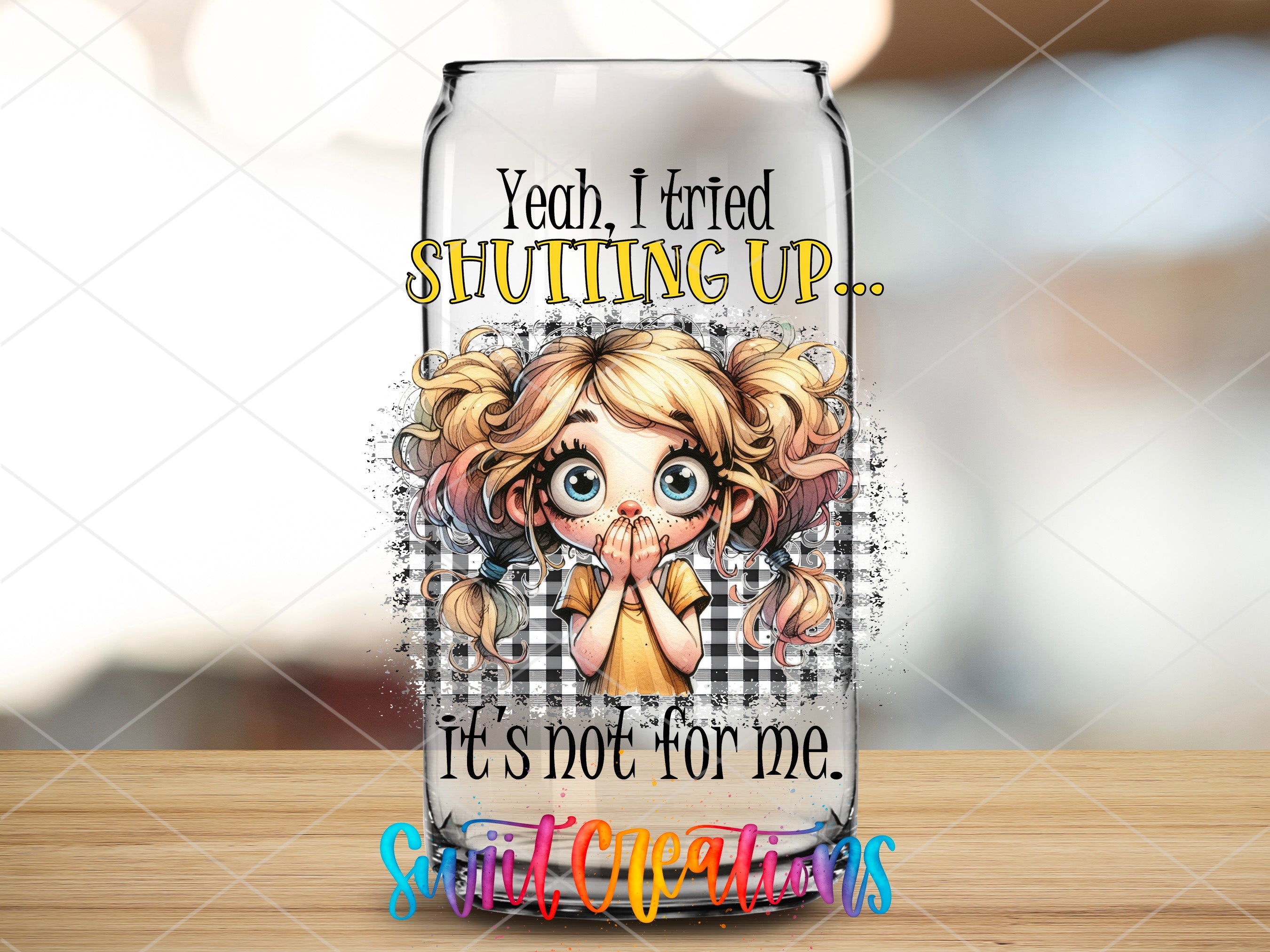 a glass with a picture of a girl on it