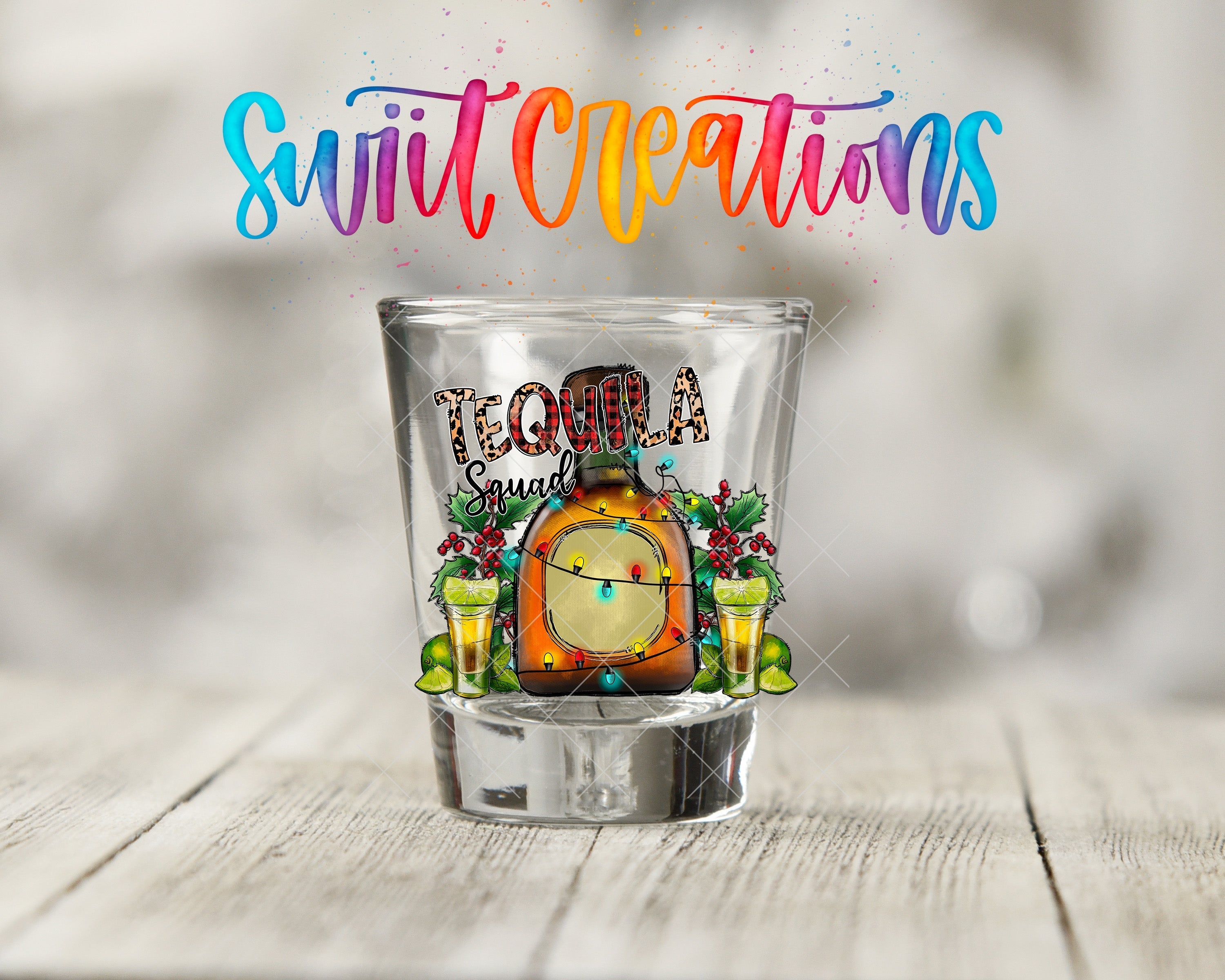 a shot glass with a picture of a clock on it
