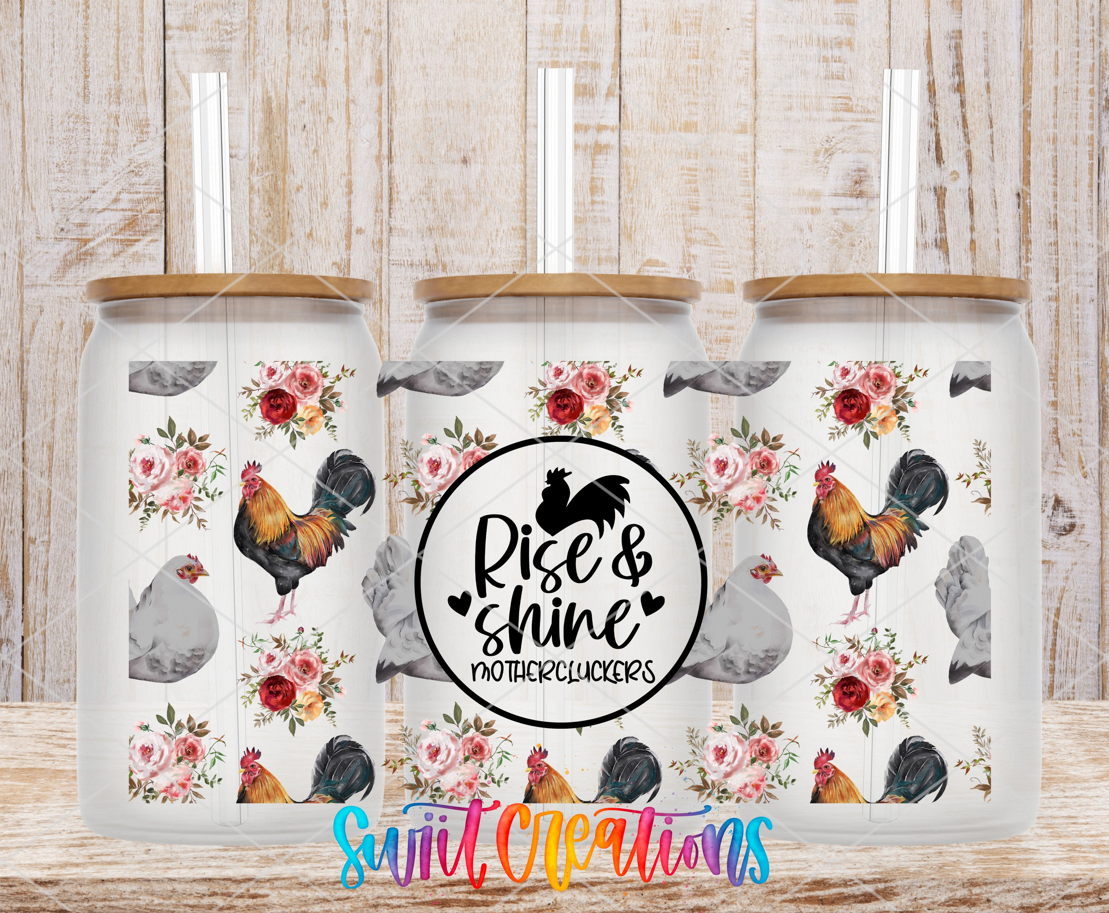 three glass tumblers with a floral pattern and rooster designs. The tumblers have a lid and straw.