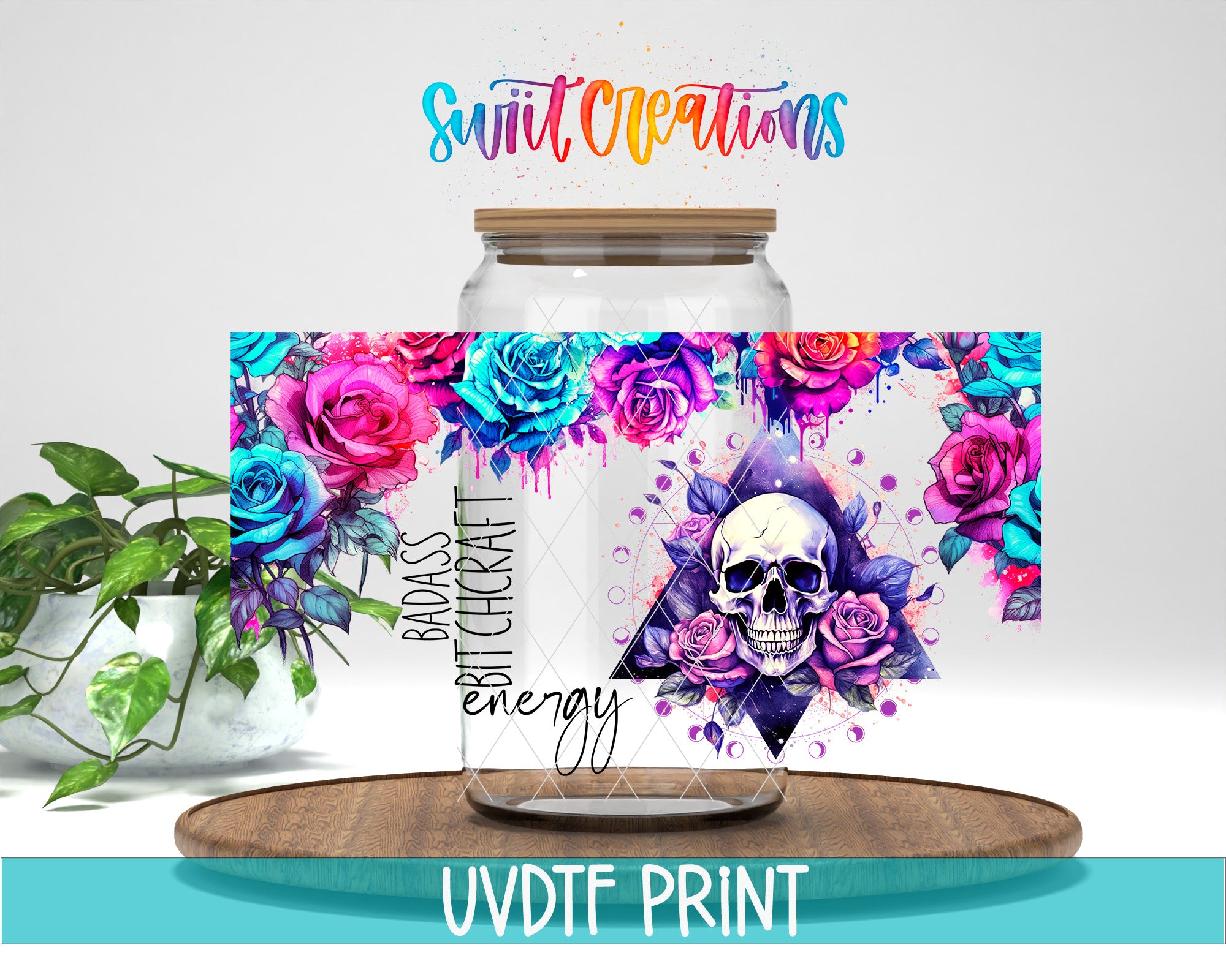 a glass jar with a colorful floral design and a skull motif, placed on a wooden surface.