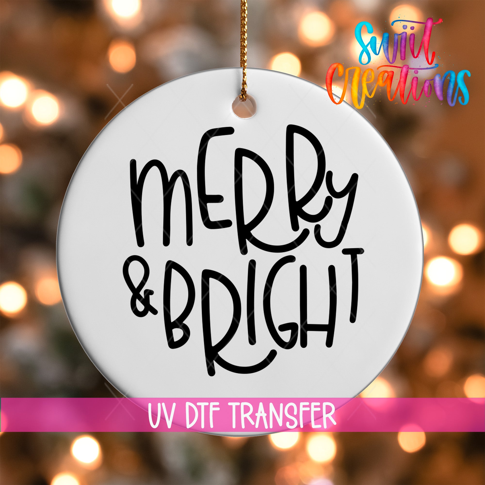 A white ornament with the text "MERRY & BRIGHT" written on it, hanging against a background of colorful lights.
