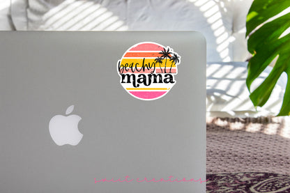 Beachy Mama sticker on the lid of a silver laptop