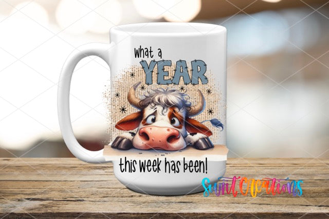 a coffee mug with a picture of a cow on it