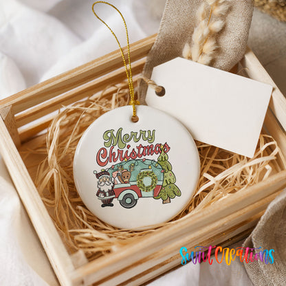 Merry Christmas Santa Camper ceramic Christmas ornament presented in a rustic wooden gift crate