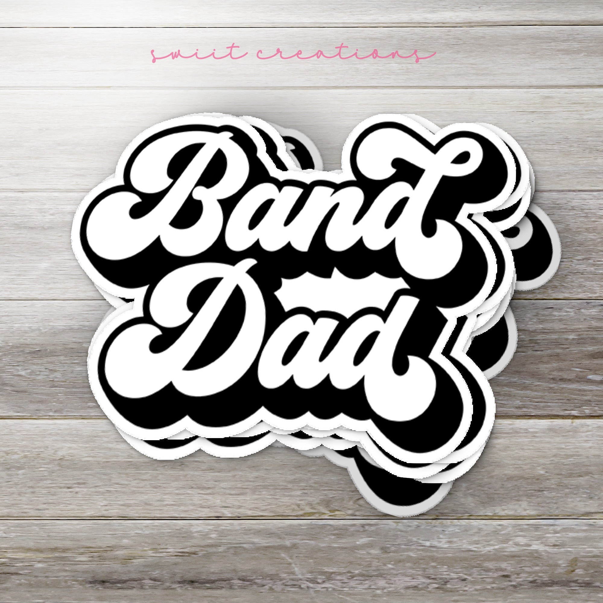 a sticker that says band dad on it