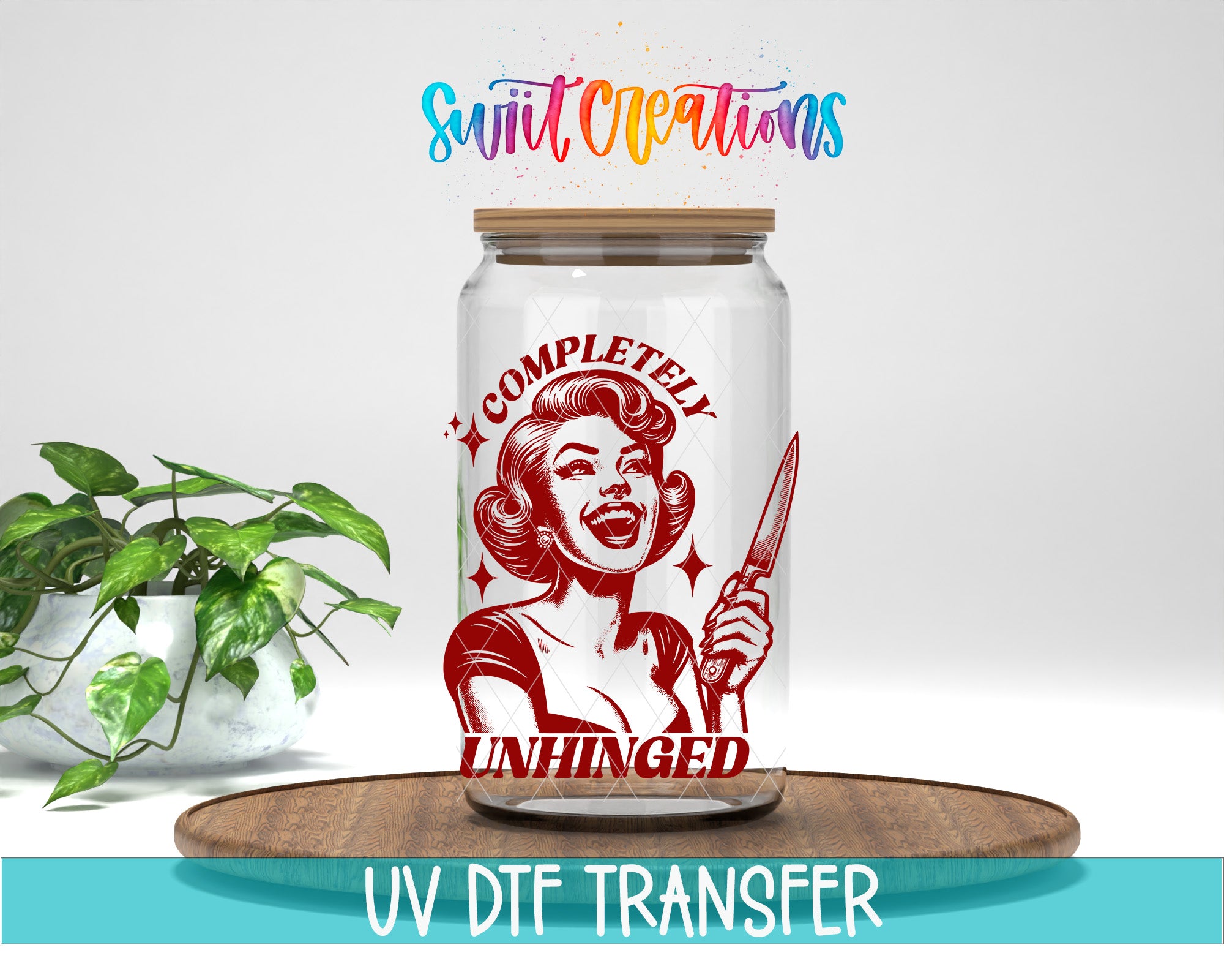 a glass jar with a red and white illustration of a smiling woman holding a knife, accompanied by the text "COMPLETELY UNHINGED" and "UV DFT TRANSFER".