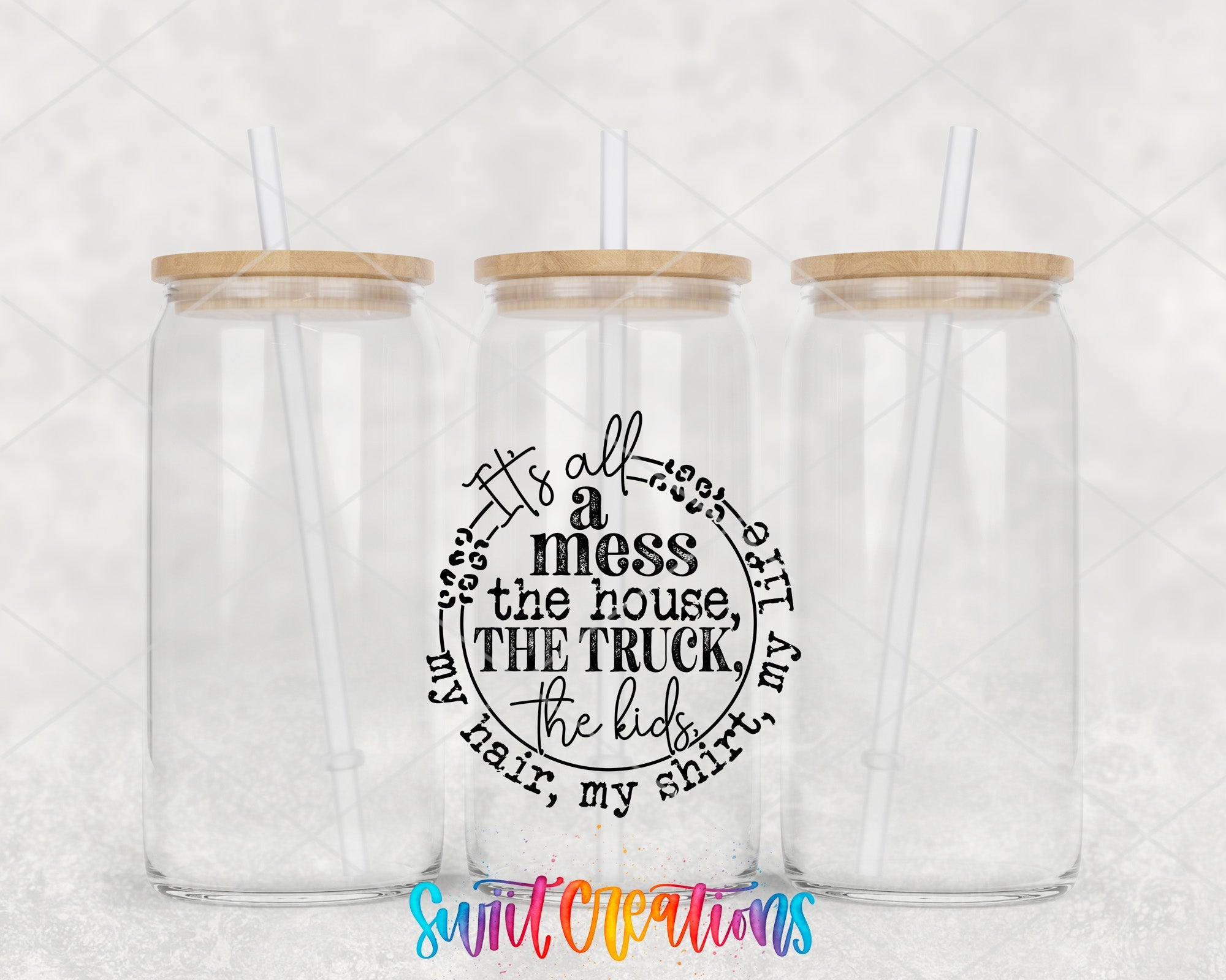 a couple of glass cups with straws in them