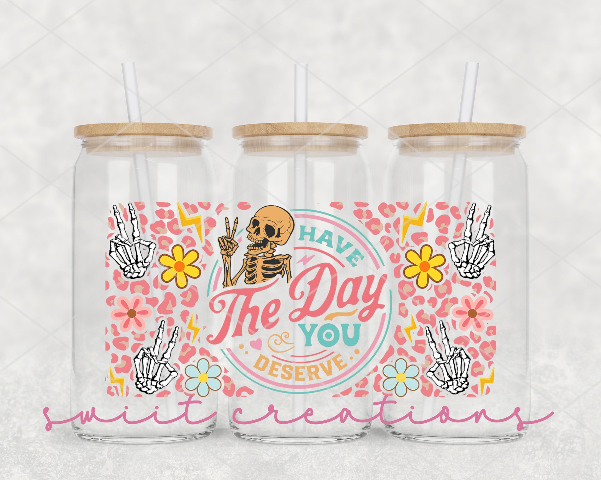 a couple of mason jars sitting on top of a table
