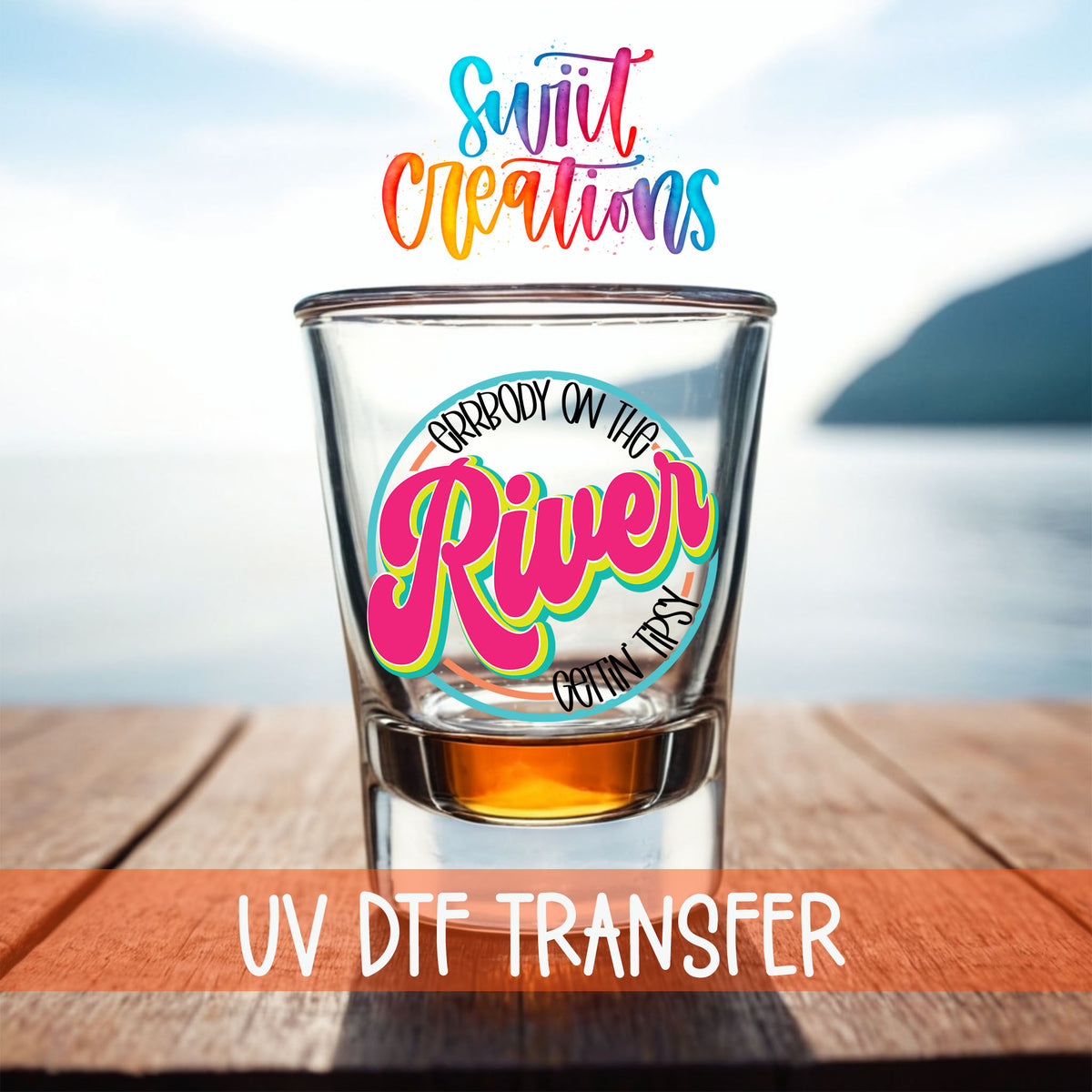 Everybody on the River Gettin Tipsy shot glass UV DTF transfer on a filled shot glass on a dock by the water