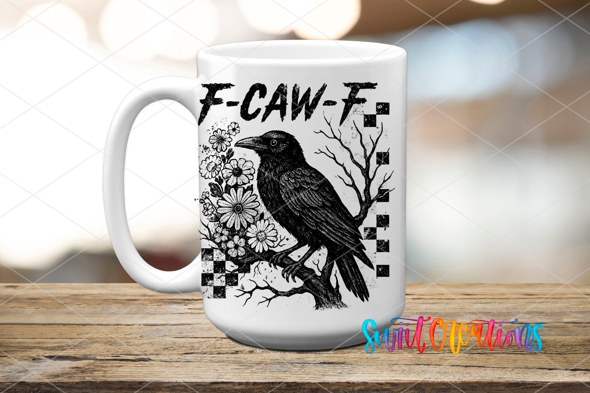 F-CAW-F Raven Gothic UV DTF transfer displayed on a white ceramic mug from Swiit Creations