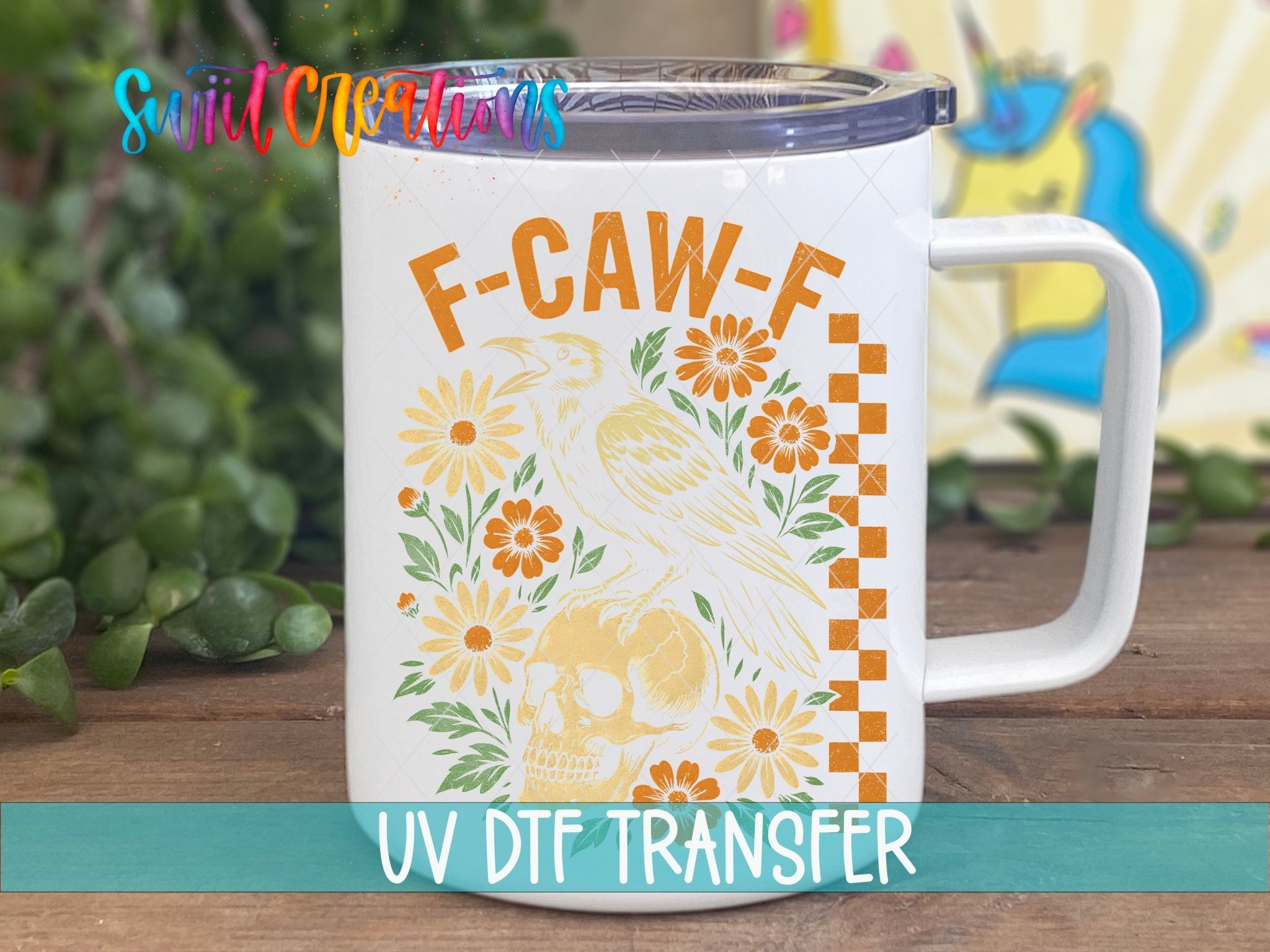 F Caw F Raven Skull Sassy Floral UV DTF transfer displayed on a white coffee mug from Swiit Creations