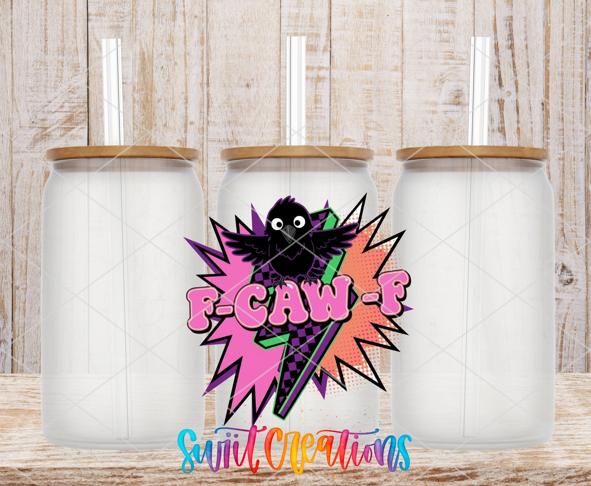 F-CAW-F UV DTF transfer applied to a clear glass can set from Swiit Creations