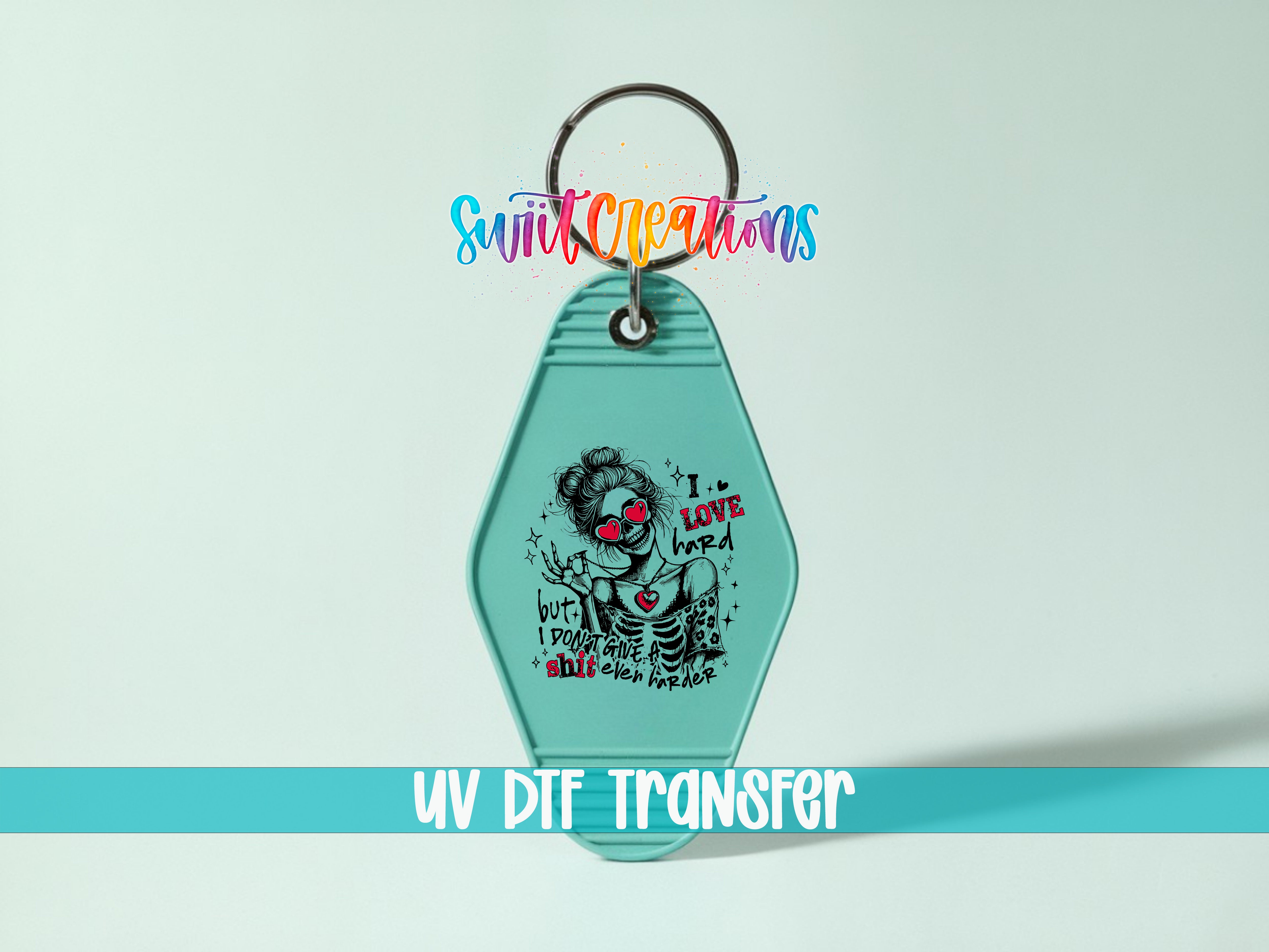 A keychain with a graphic design featuring a skeleton wearing sunglasses and the text "I LOVE HARD" printed on it.
