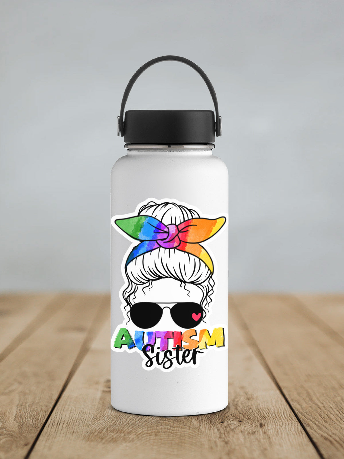 Autism Sister sticker on a white insulated water bottle