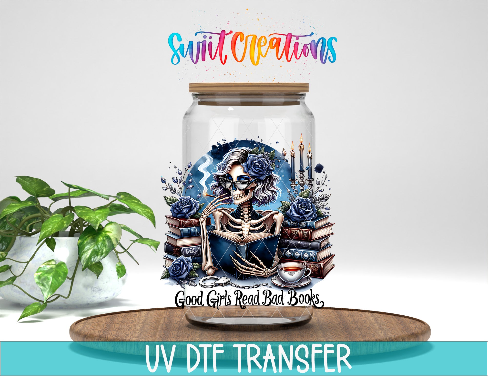 a glass jar with a skull design and various books and flowers surrounding it, placed on a wooden surface.