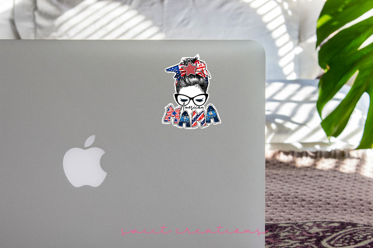 a laptop with a sticker of a woman wearing a bandana