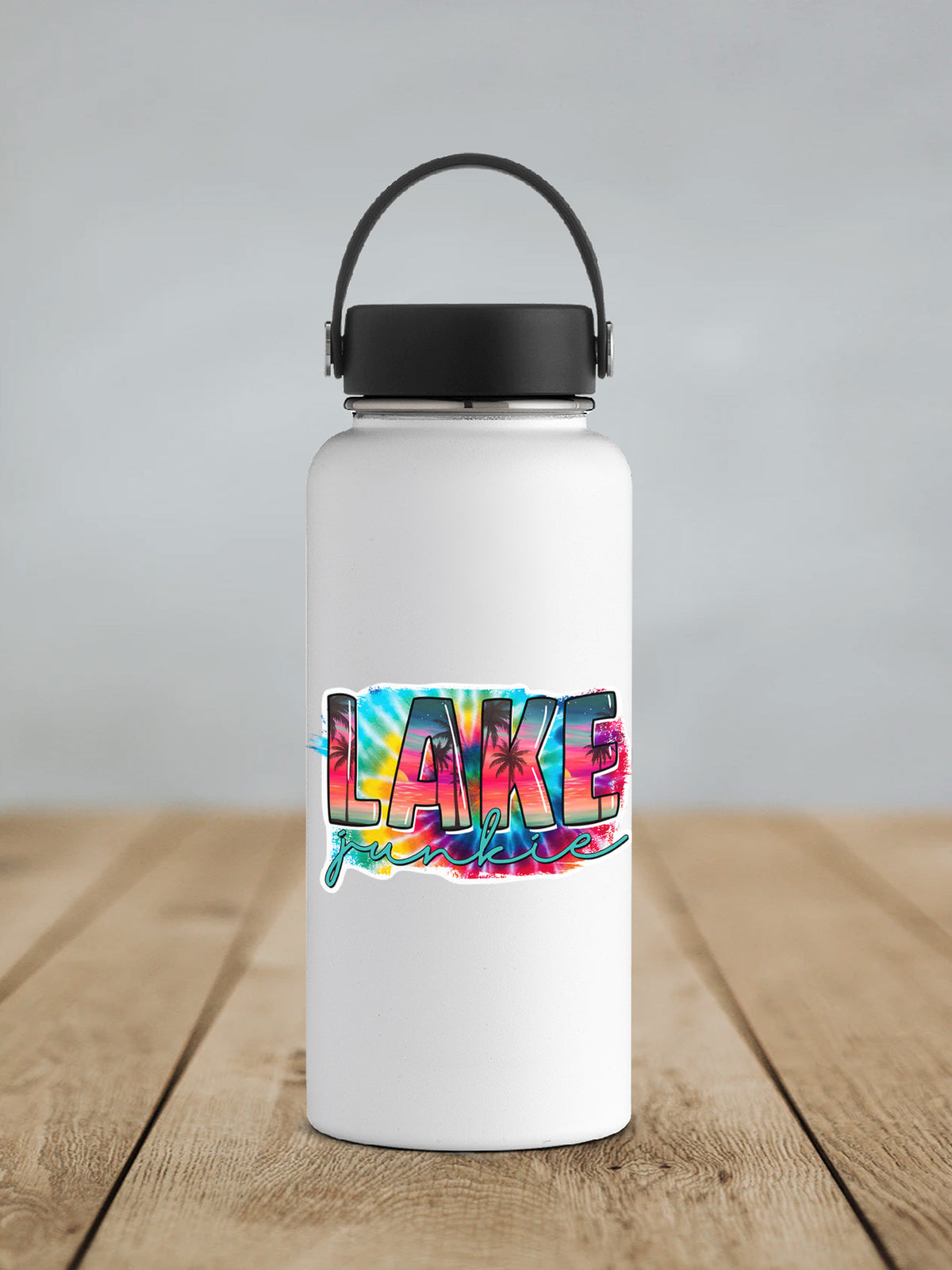 Lake Junkie sticker on a white insulated water bottle