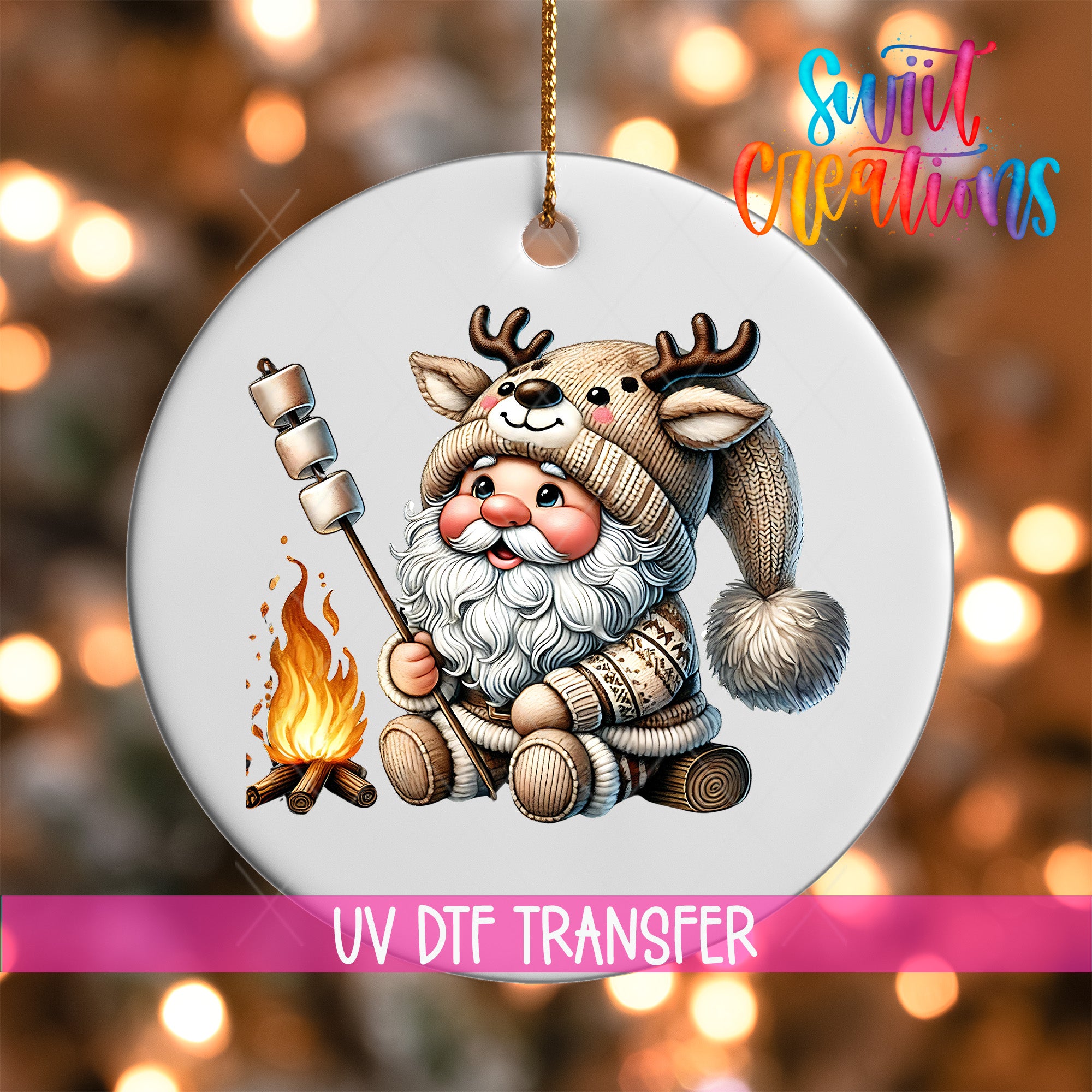 A white ornament featuring a cartoon Santa Claus character wearing a hat with antlers, holding a marshmallow over a campfire.