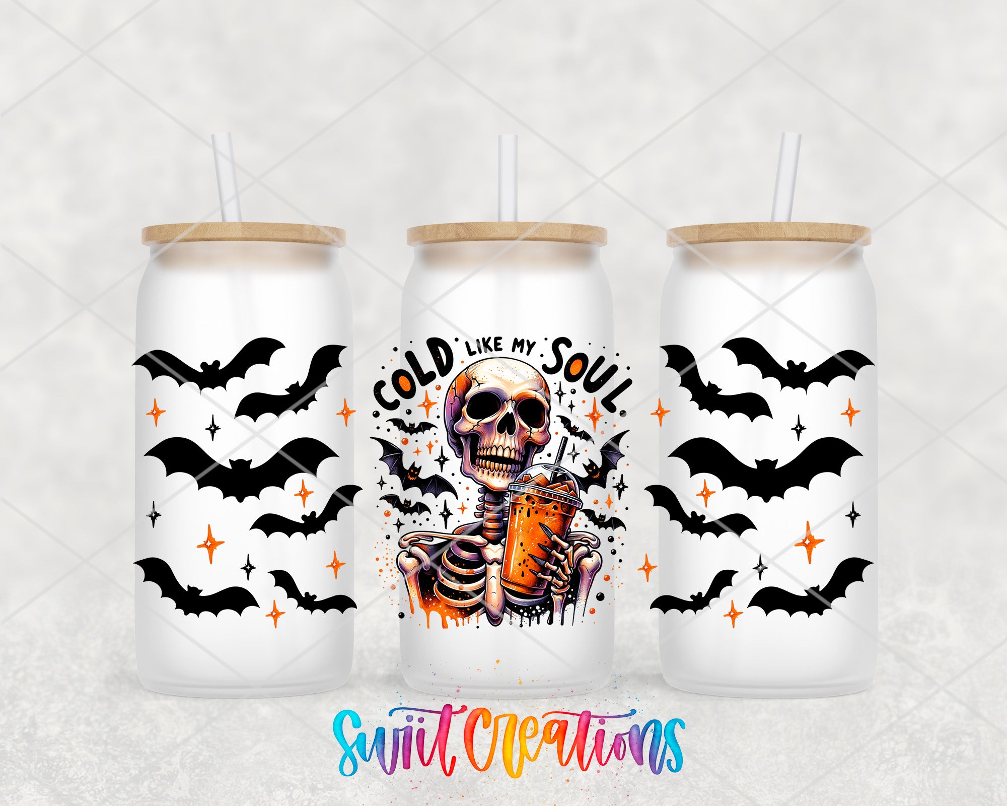 three white tumblers with black bat designs and a skull design, along with the text "COLD LIKE MY SOUL" and "Swit Creations" printed on them.