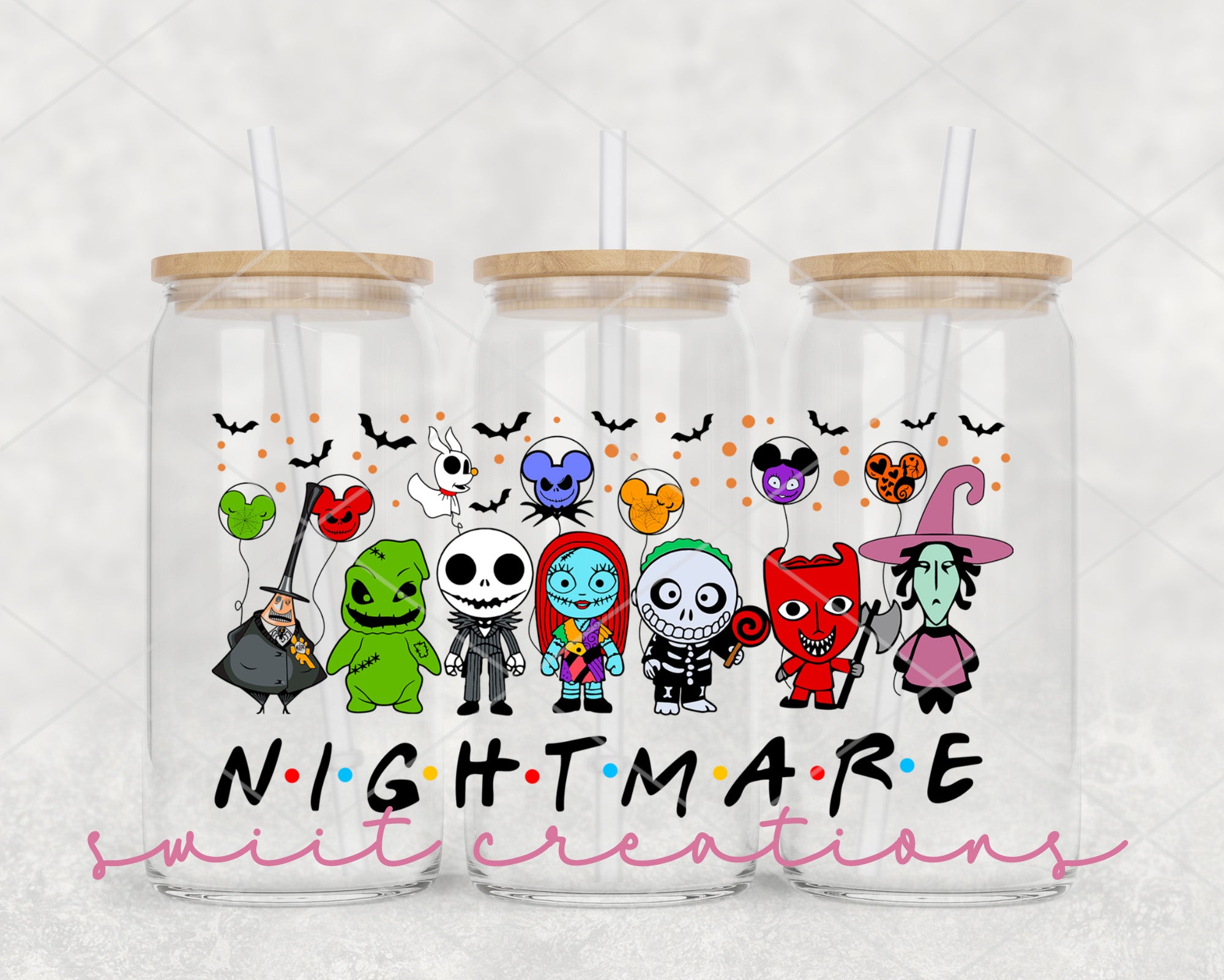 a couple of glass cups with cartoon characters on them